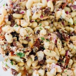 Mediterranean tuna white bean salad is full of flavorful ingredients and deliciously tasty tuna that is full of protein! An easy and healthy lunch option for those who are looking for new lunch ideas that will keep you full!