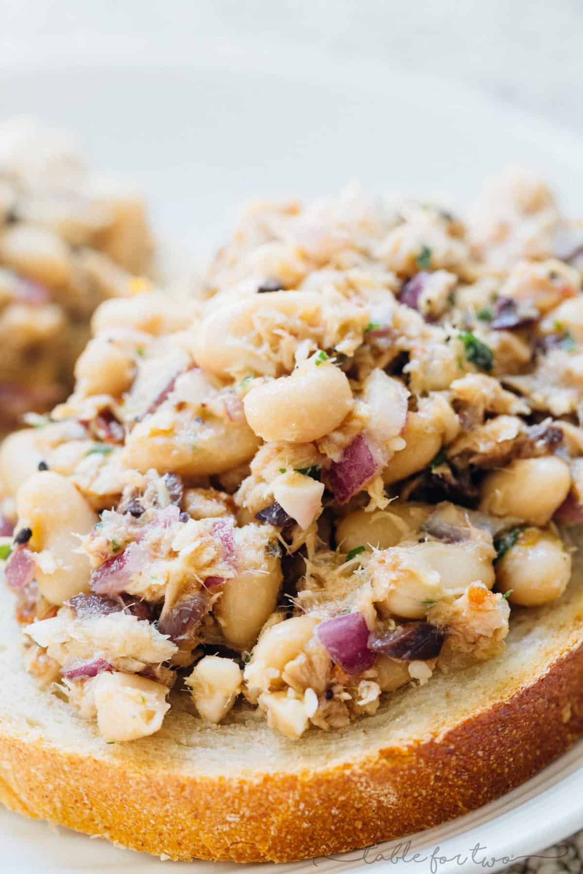 Mediterranean tuna white bean salad is full of flavorful ingredients and deliciously tasty tuna that is full of protein! An easy and healthy lunch option for those who are looking for new lunch ideas that will keep you full!