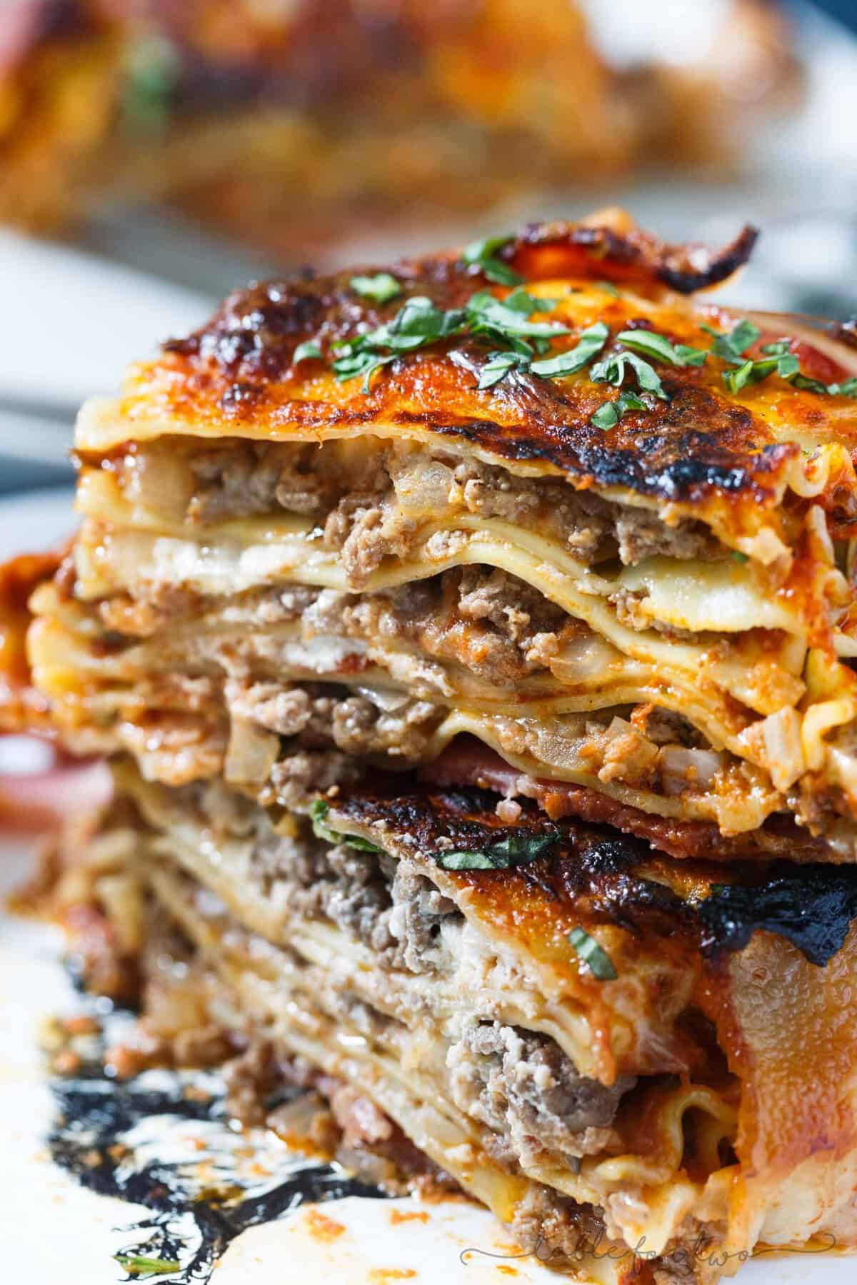 Who could say no to bacon wrapped lasagna? Once you have a bite of this, you will won't want to make lasagna any other way! This is such an awesome, decadent spin on the classic and traditional lasagna!