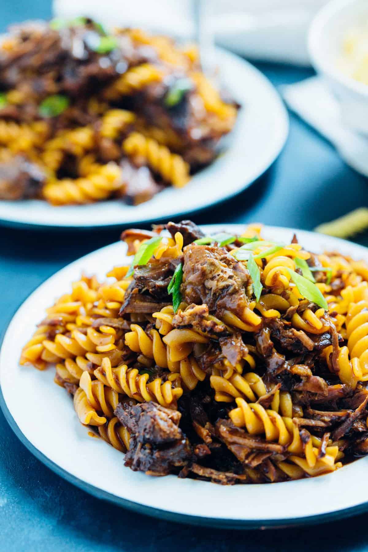 This pressure cooker (Instant Pot) braised Korean beef ragu has got spice, depth of flavor, and so much goodness. Best part? Pressure cooker friendly which means super tender and fall apart beef in about 40 minutes! This is the stick to your ribs dish you'll want when you are in the mood for a rich and dense dish!