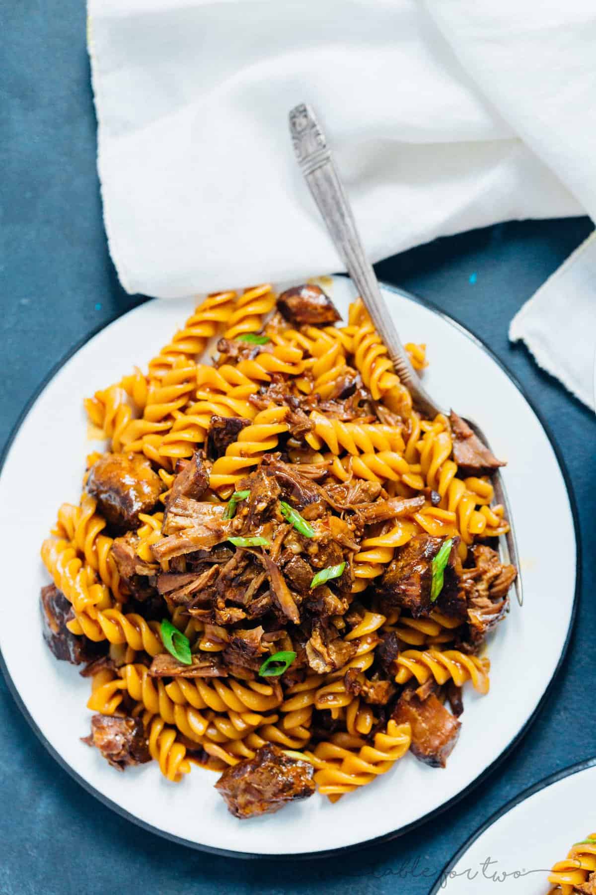 This pressure cooker (Instant Pot) braised Korean beef ragu has got spice, depth of flavor, and so much goodness. Best part? Pressure cooker friendly which means super tender and fall apart beef in about 40 minutes! This is the stick to your ribs dish you'll want when you are in the mood for a rich and dense dish!