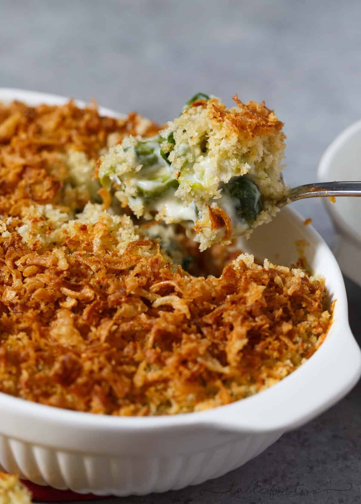 Pretty sure if you hate brussels sprouts, you haven't had them the right way. This roasted brussels sprouts gratin with garlic crumble and fried onion topping is going to elevate your side dish game at any party or potluck AND you will fall in love with brussels sprouts all over again! PROMISE!