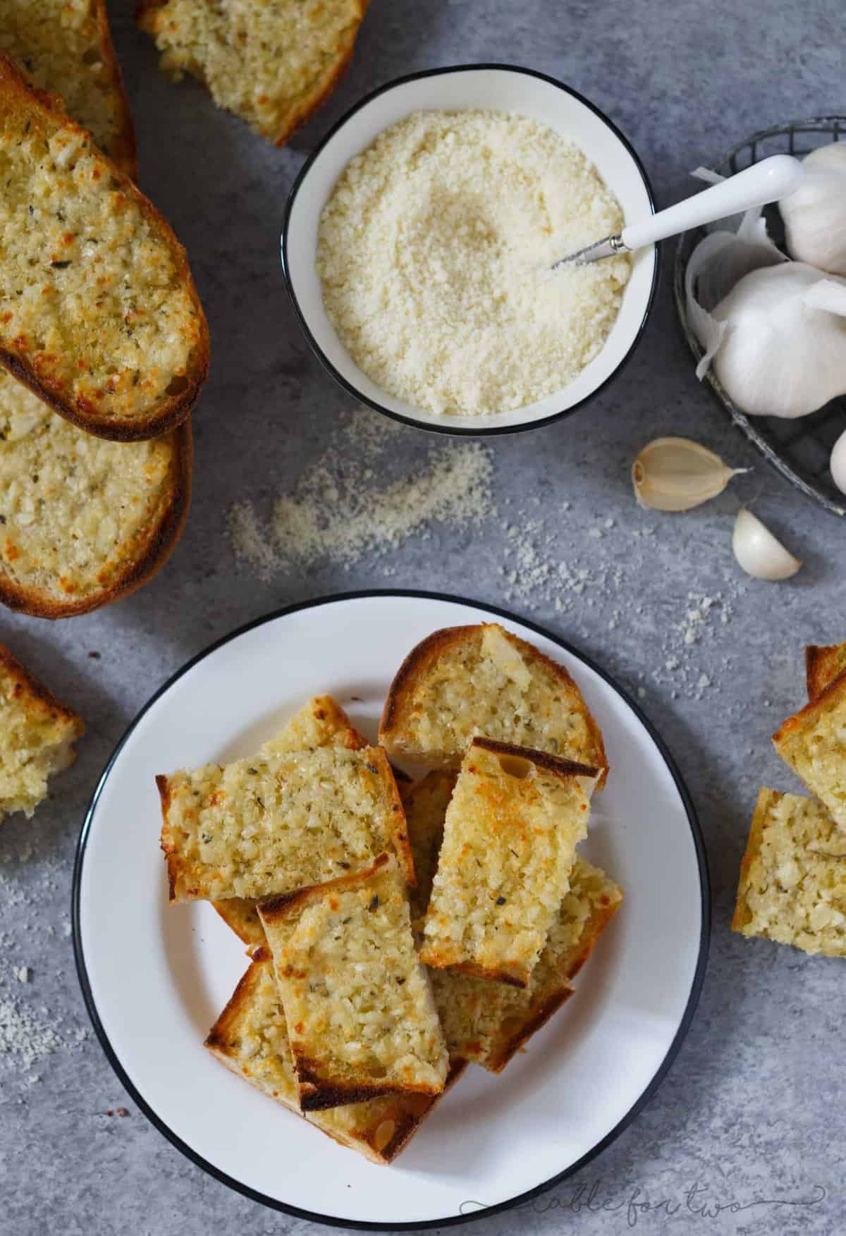 The title of this recipe says it all. Kiss me if you dare because after noshing on this extra garlicky and cheesy bread, you're probably going to second guess it. However, eating this bread is 100% worth the garlicky breath.