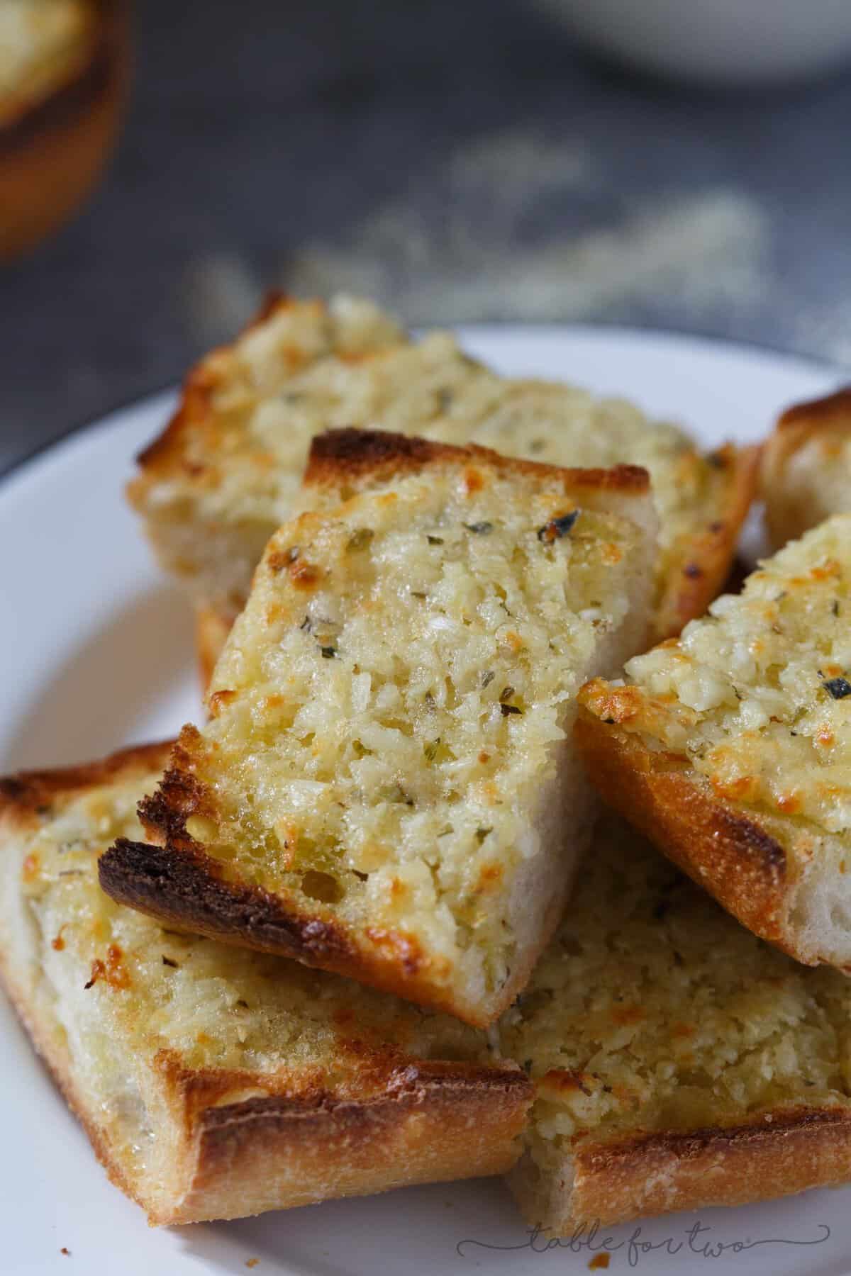 The title of this recipe says it all. Kiss me if you dare because after noshing on this extra garlicky and cheesy bread, you're probably going to second guess it. However, eating this bread is 100% worth the garlicky breath.