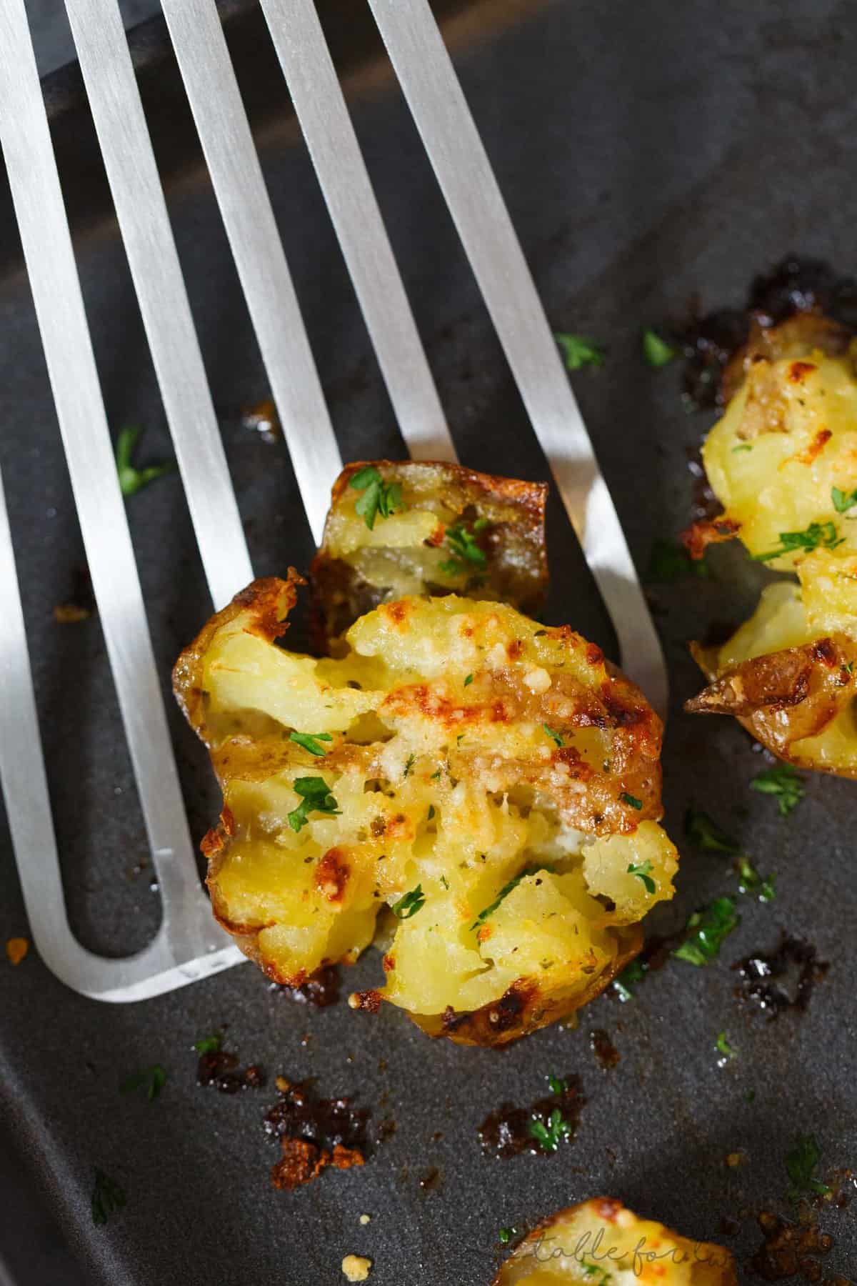 Smashed potatoes are a great alternative to mashed potatoes! These smashed potatoes are topped with a garlic ranch butter then parmesan cheese is sprinkled on top! SO GOOD!!