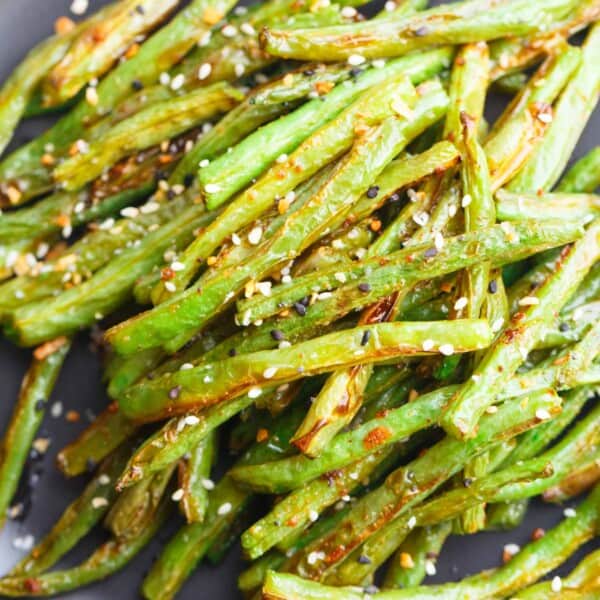 These garlic roasted green beans are the perfect side dish addition to any table and meal! They will convert you to love green beans if you don't already!