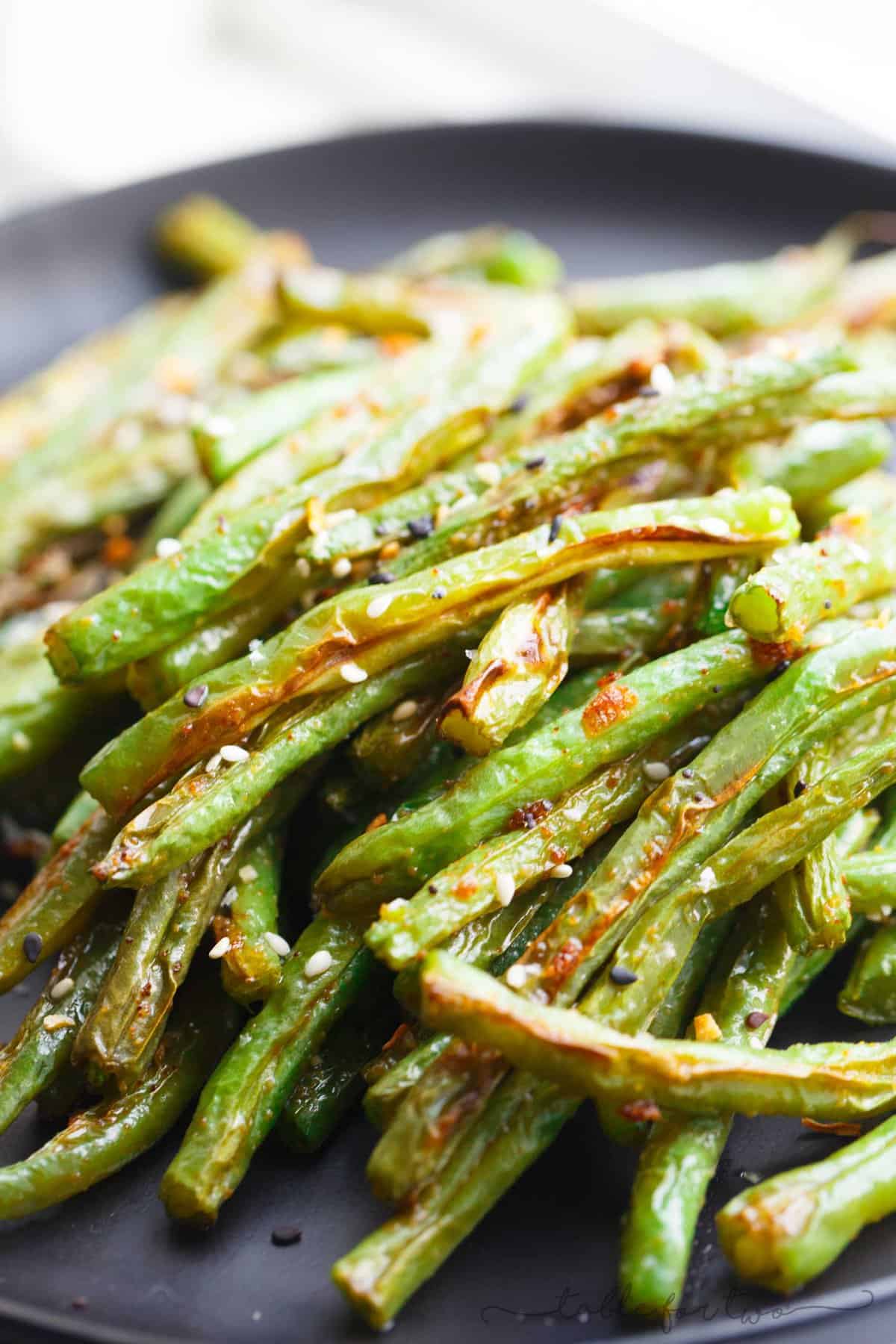 These garlic roasted green beans are the perfect side dish addition to any table and meal! They will convert you to love green beans if you don't already!