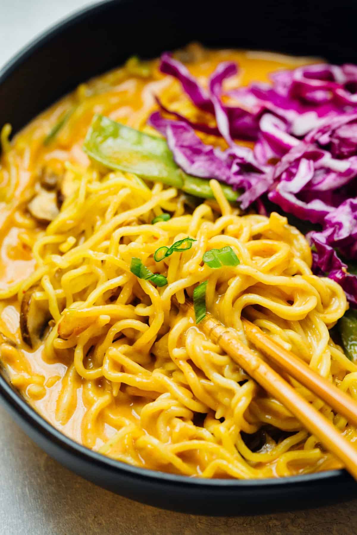 This coconut curry ramen will warm you right up! A delicious broth coats the tender ramen noodles. You will want to slurp up every last drop of this soup and ramen!