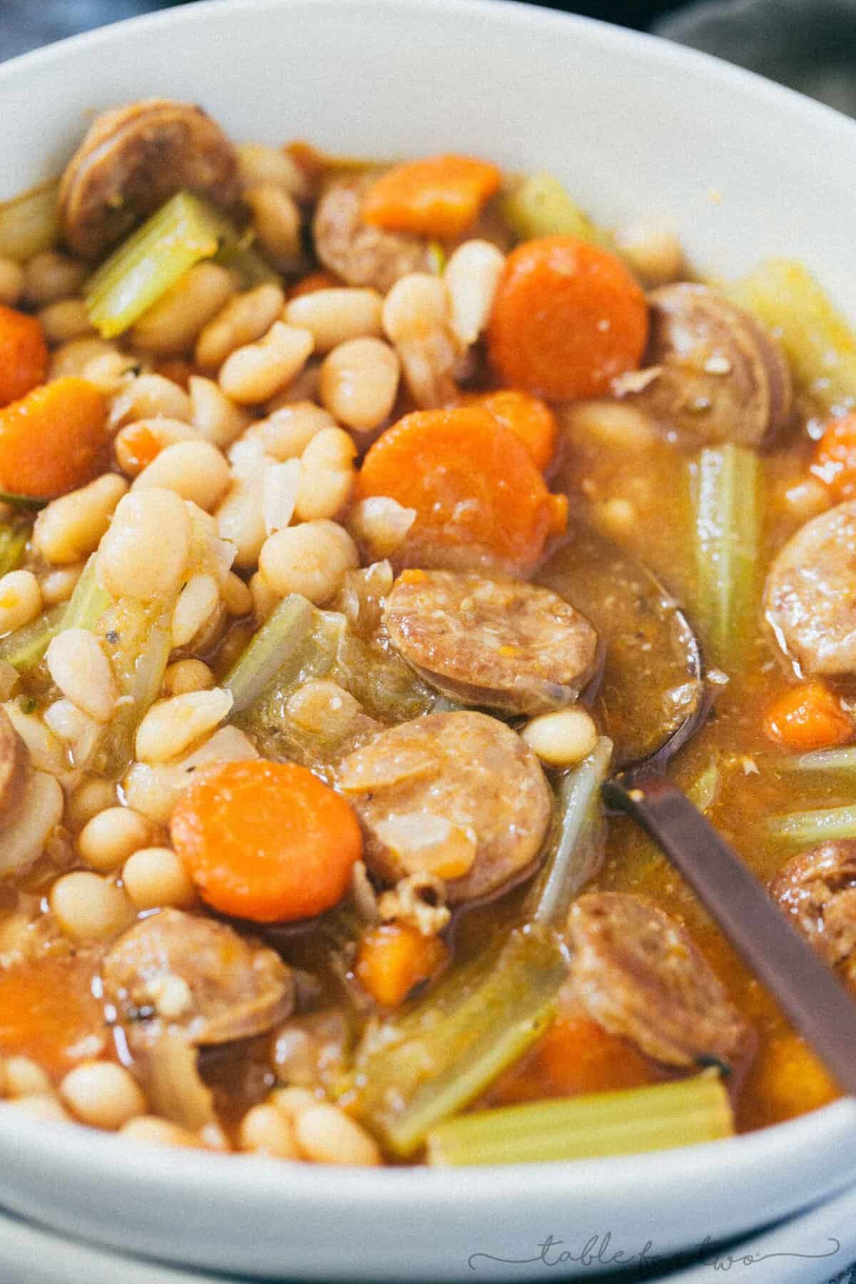 A deliciously flavorful herbed white bean and sausage soup that requires no beans to be soaked! This will be a new Instant Pot favorite!