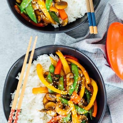 If you're in a dinner rut and need a quick and flavorful dinner idea, this 20-minute vegetable stir fry has got it all! Super easy to prep ahead of time, too! #stirfry #vegetablestirfry #vegetables #veggiestirfry #quickdinner