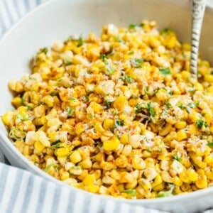 A less messy way to eat Mexican street corn! This Mexican street corn off the cob is one you'll want to make for all your parties year-round! #mexicanstreetcorn #corn #mexican #sidedish #cornrecipe