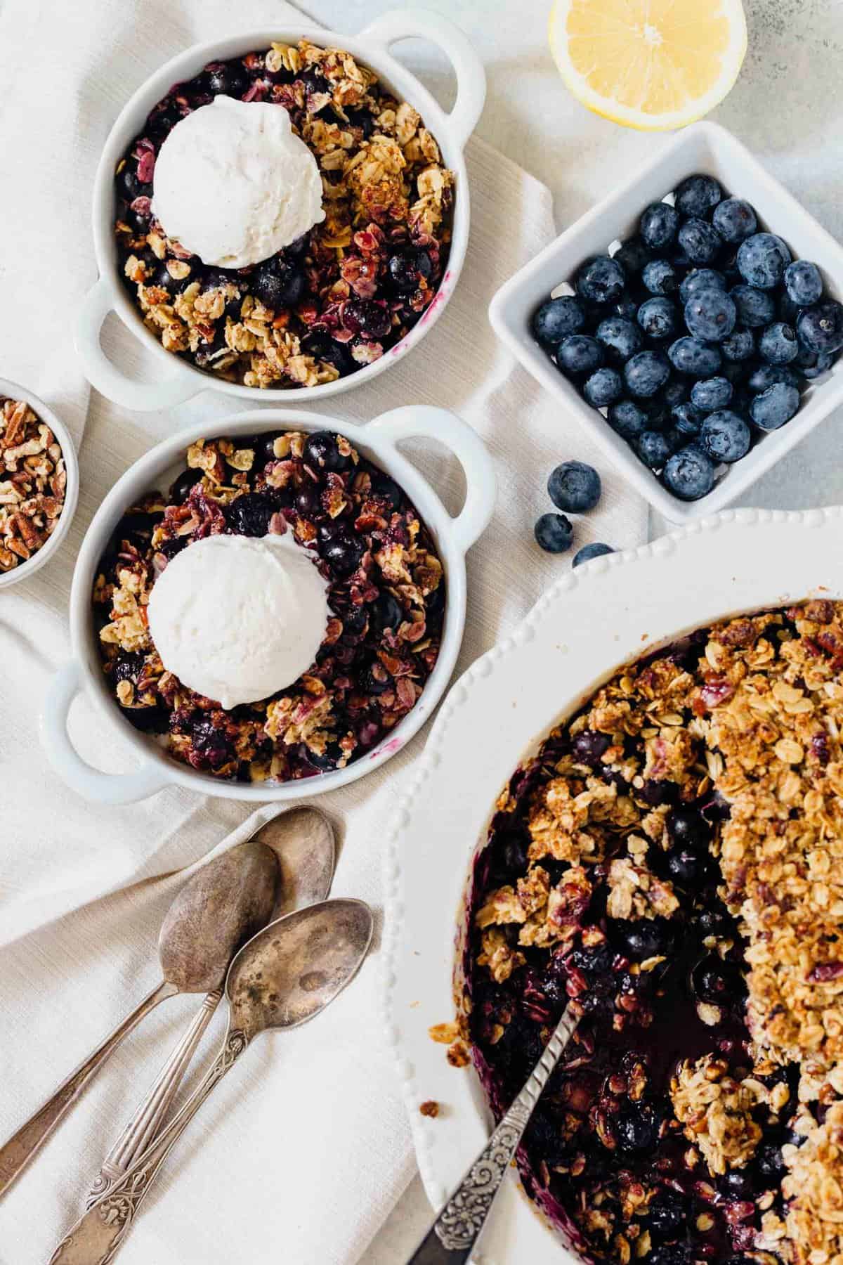 This blueberry pecan crumble is effortless to put together but it is an exceptional dessert to have to finish off any dinner party or get-together! #blueberrycrumble #blueberrypecan #blueberry #pecan #blueberrydessert #dessert #summerdessert