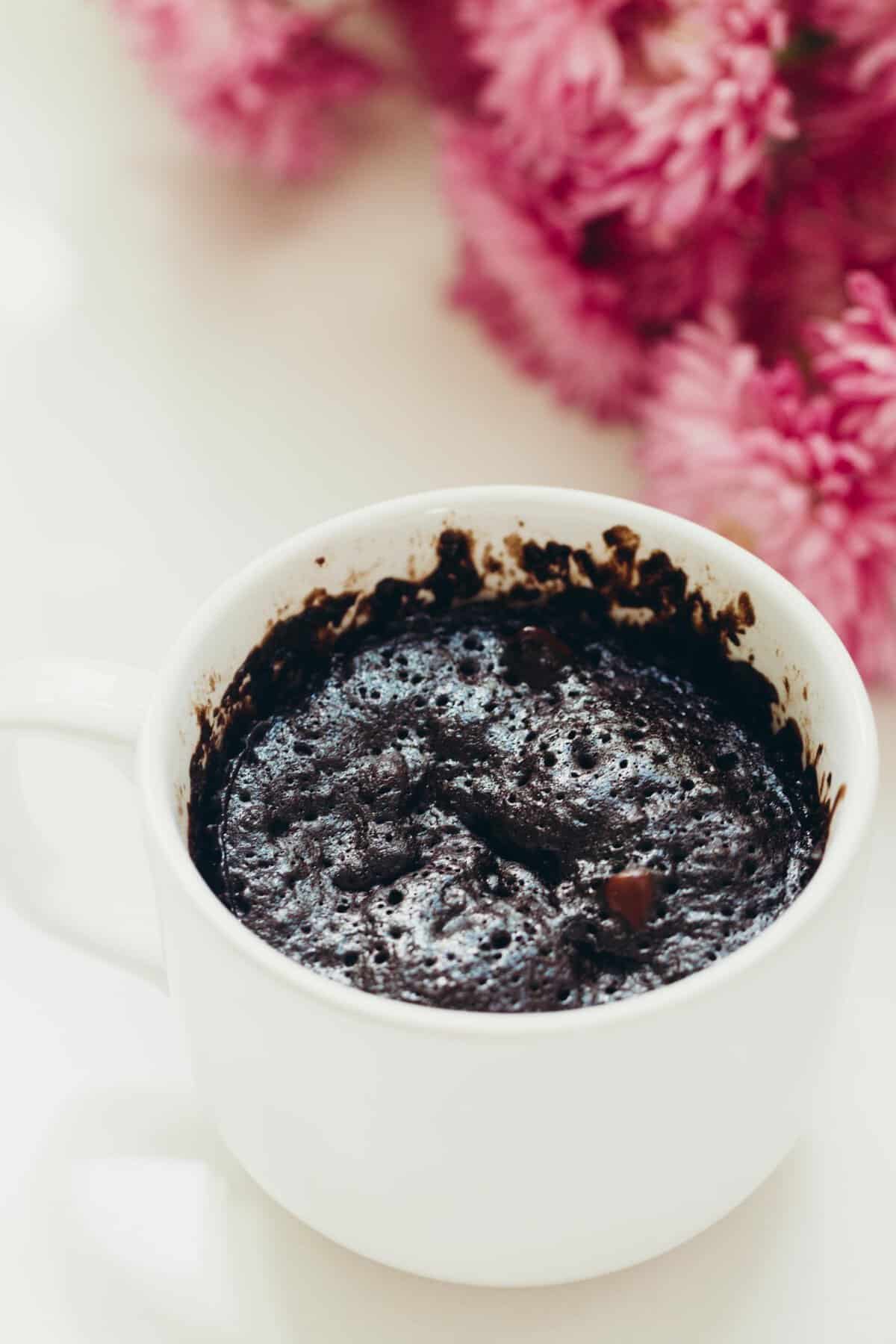 This dark chocolate mug cake is, well, a dark chocolate version of my famous chocolate mug cake that everyone loves. You gotta have options when the craving hits! #darkchocolate #cakeinamug #mugcake #chocolatemugcake #dessertforone #singleserving