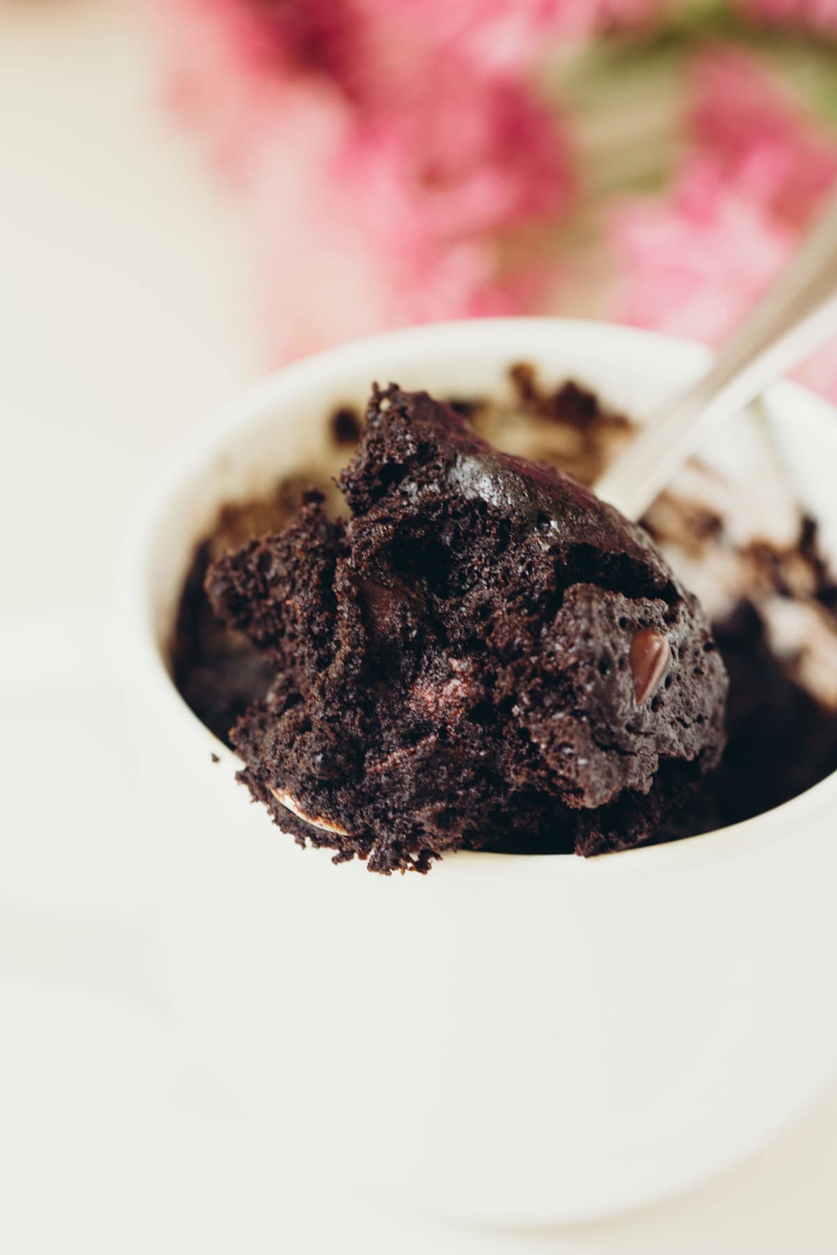 This dark chocolate mug cake is, well, a dark chocolate version of my famous chocolate mug cake that everyone loves. You gotta have options when the craving hits! #darkchocolate #cakeinamug #mugcake #chocolatemugcake #dessertforone #singleserving