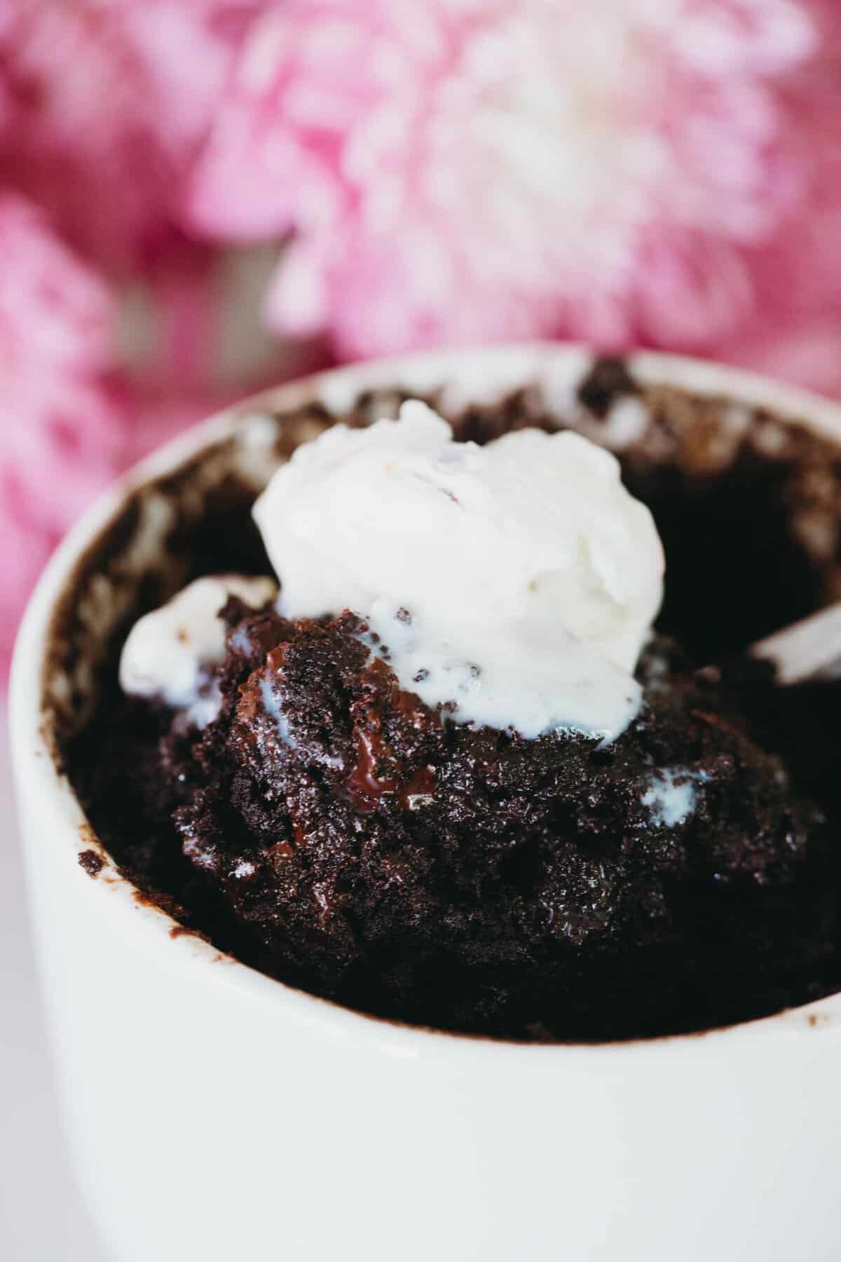 This dark chocolate mug cake is, well, a dark chocolate version of my famous chocolate mug cake that everyone loves. You gotta have options when the craving hits! #darkchocolate #cakeinamug #mugcake #chocolatemugcake #dessertforone #singleserving