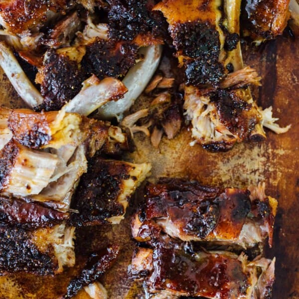 These tender honey butter ribs are oven baked to perfection and they fall off the bone! They are literally bathed in honey, butter, and brown sugar. There is no way you will be able to put this down! #honey #butter #ribs #babybackribs #ovenbaked #pork #porkrecipe