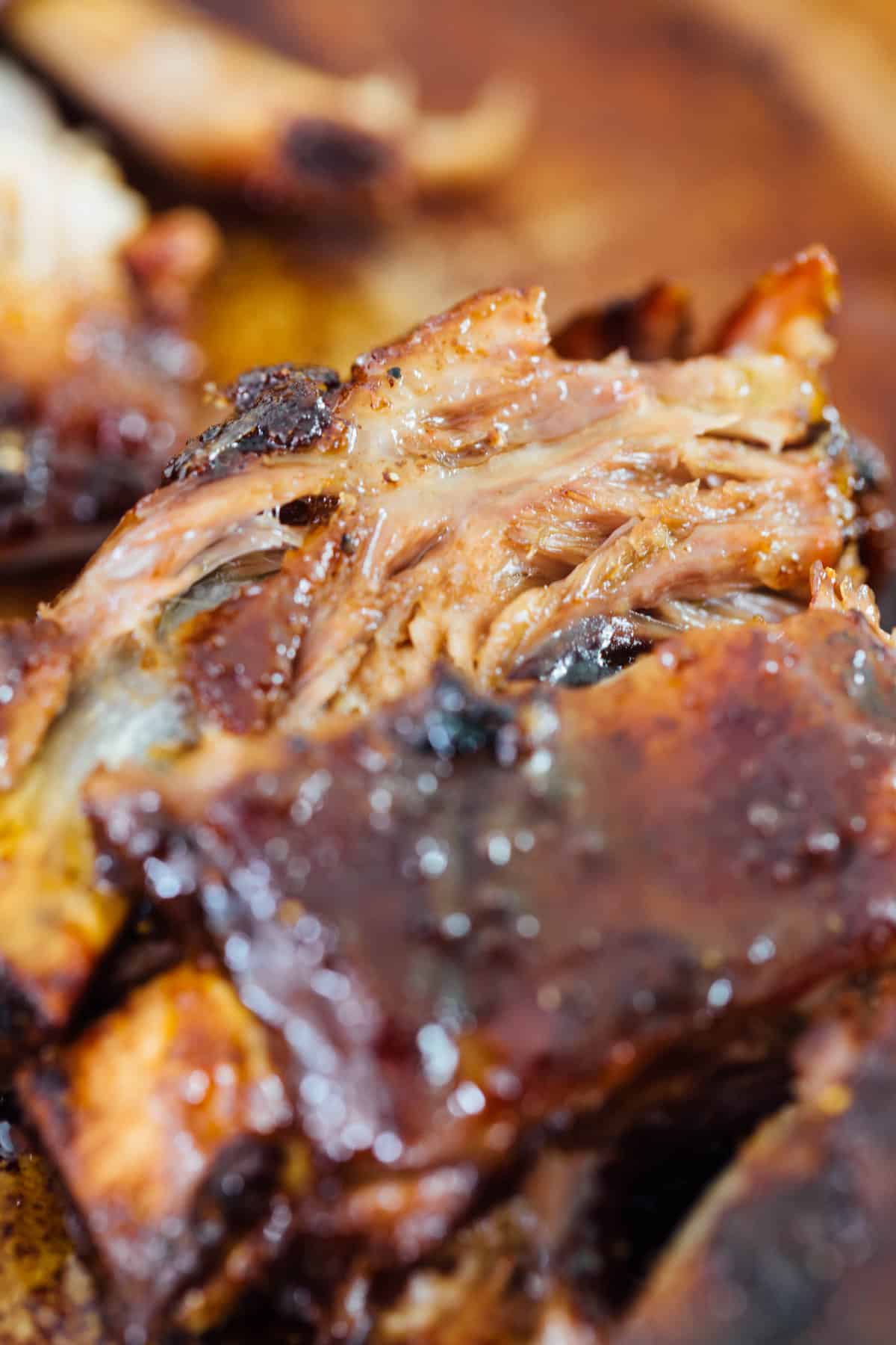 These tender honey butter ribs are oven baked to perfection and they fall off the bone! They are literally bathed in honey, butter, and brown sugar. There is no way you will be able to put this down! #honey #butter #ribs #babybackribs #ovenbaked #pork #porkrecipe