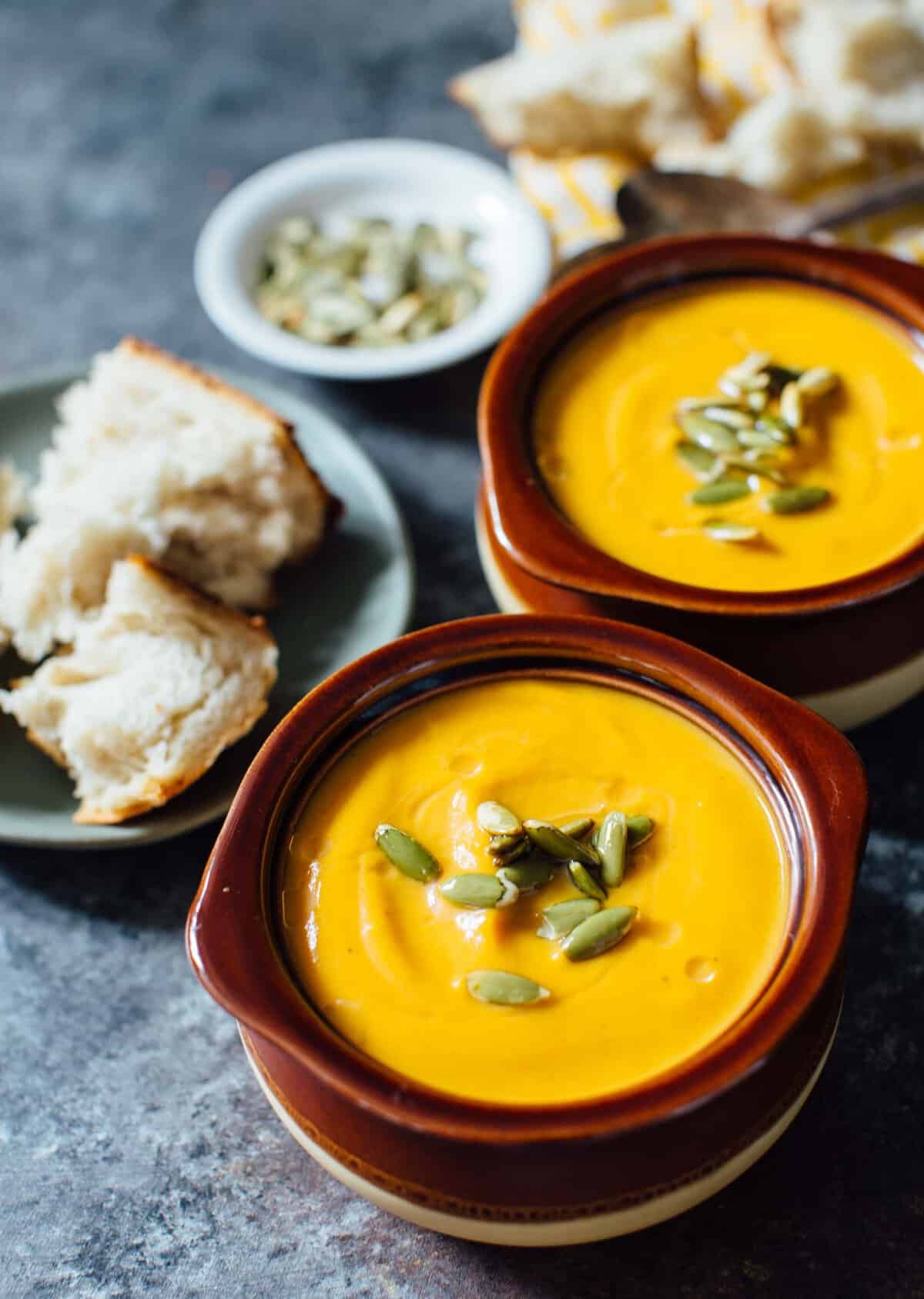 A creamy seasonal soup that you can have year-round. This Instant Pot autumn harvest butternut squash soup is a copycat from Panera that you know and love! #butternutsquash #soup #recipes #souprecipes #panera #paneracopycat #squashrecipes #falleats
