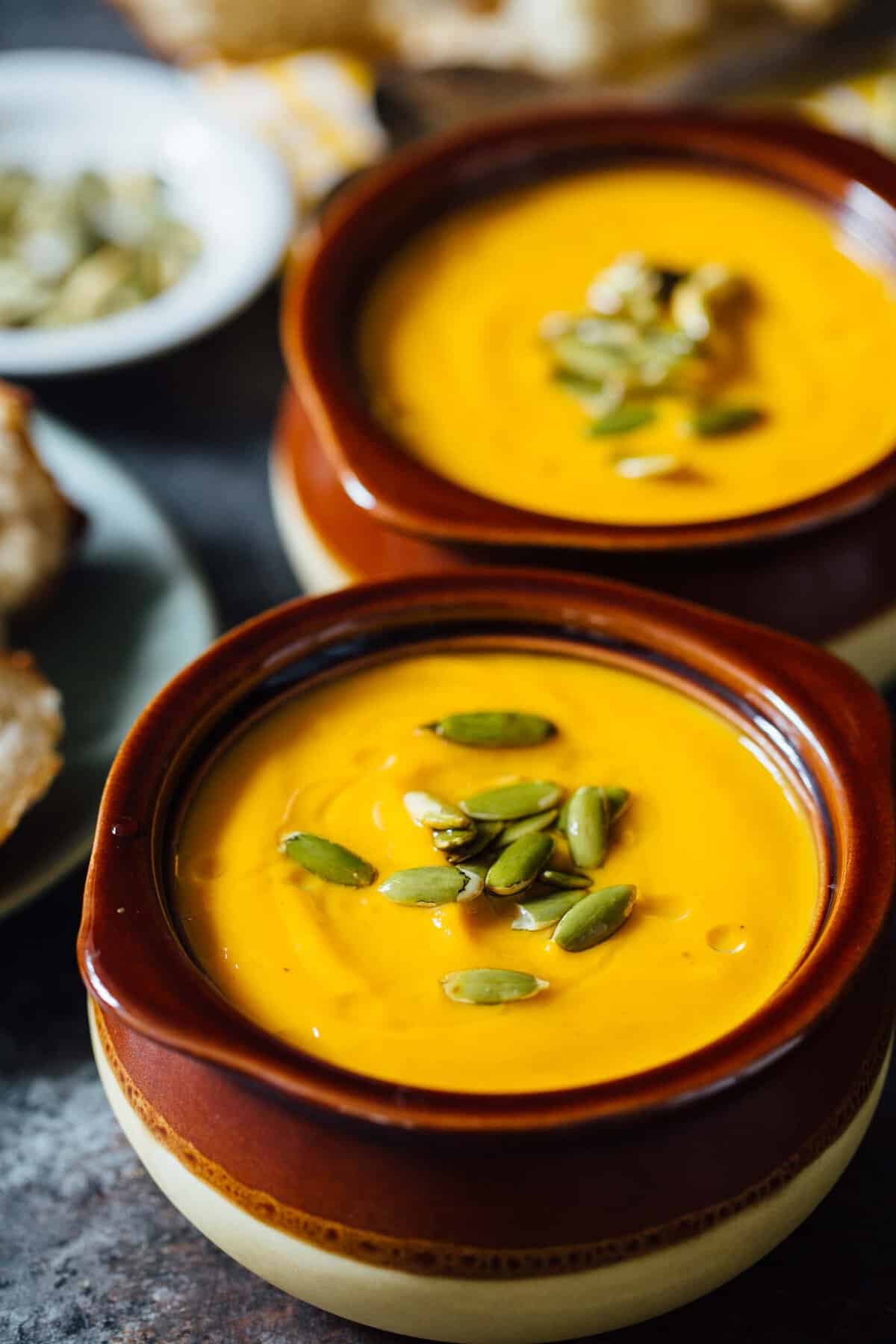 A creamy seasonal soup that you can have year-round. This Instant Pot autumn harvest butternut squash soup is a copycat from Panera that you know and love! #butternutsquash #soup #recipes #souprecipes #panera #paneracopycat #squashrecipes #falleats