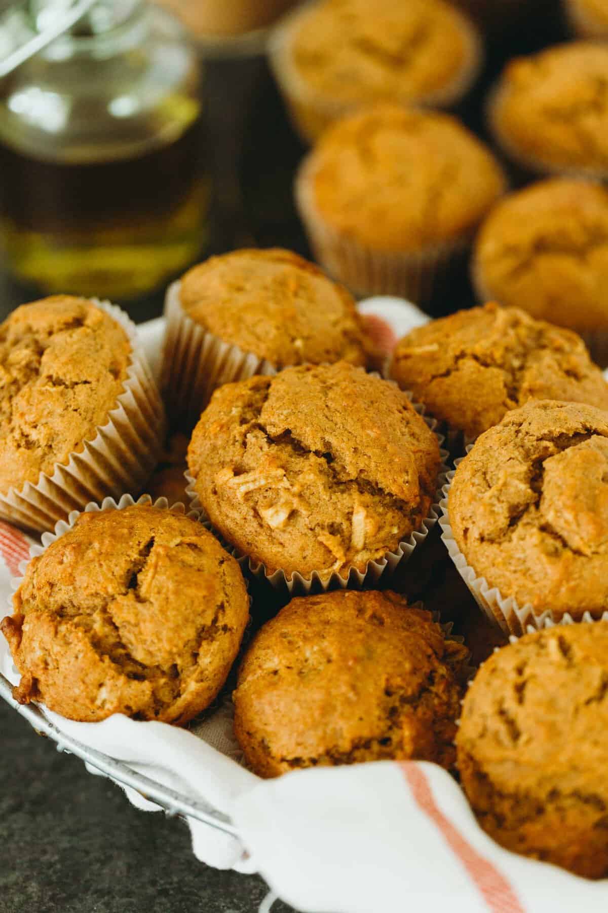 Soft and tender pumpkin apple olive oil muffins are the perfect muffins to make for Fall! The robust olive oil with the fresh apples make for a delicious flavor combination! #pumpkinrecipes #applerecipes #pumpkinapple #pumpkin #muffinrecipe #fallflavor