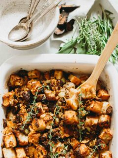 A unique take on the traditional Thanksgiving stuffing! This focaccia stuffing is filled with dried figs and chicken sausage for sweet and savory flavors! #thanksgiving #sidedishes #thanksgivingrecipes #stuffing #stuffingrecipe #focaccia #sausage #fig