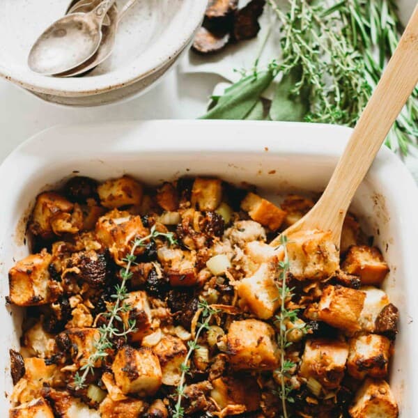 A unique take on the traditional Thanksgiving stuffing! This focaccia stuffing is filled with dried figs and chicken sausage for sweet and savory flavors! #thanksgiving #sidedishes #thanksgivingrecipes #stuffing #stuffingrecipe #focaccia #sausage #fig