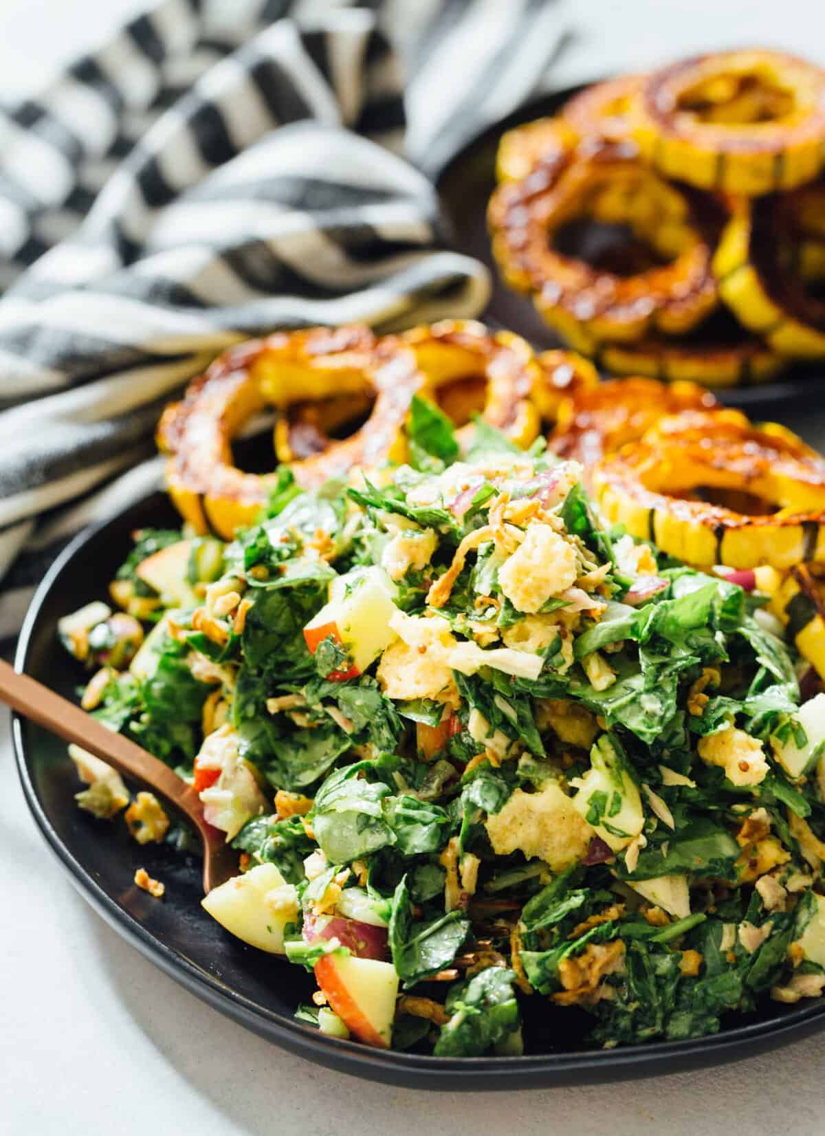 A spinach tuna salad topped with roasted delicata squash is a heavenly combination! The delicata squash gives it a unique yet distinct sweetness but it also adds volume to make this salad hearty and filling!