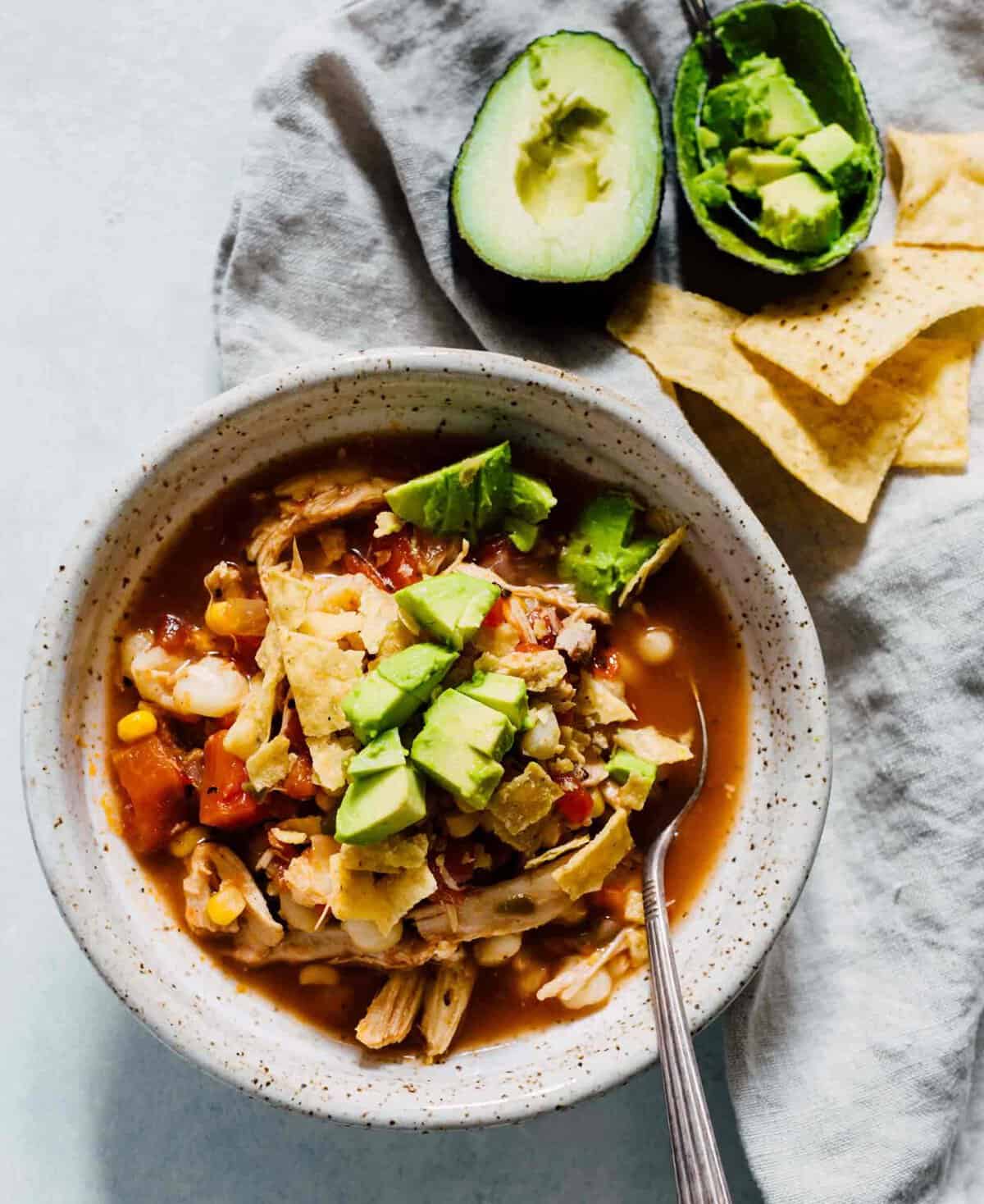 This chicken tortilla soup made on the stovetop is deliciously flavorful and spicy! You'll love how quickly it comes together and all the textures throughout the soup! The broth is SO good you'll be going back for more bowls!