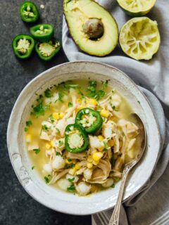 This Instant Pot jalapeño lime chicken soup is beyond flavorful! The spicy broth has hearty additions of hominy, corn, and shredded chicken. Put this all together in less than an hour! #instantpot #instantpotrecipes #pressurecooker #pressurecookerrecipes #eatthis #makethisnow #soup #souprecipes #chickenrecipes