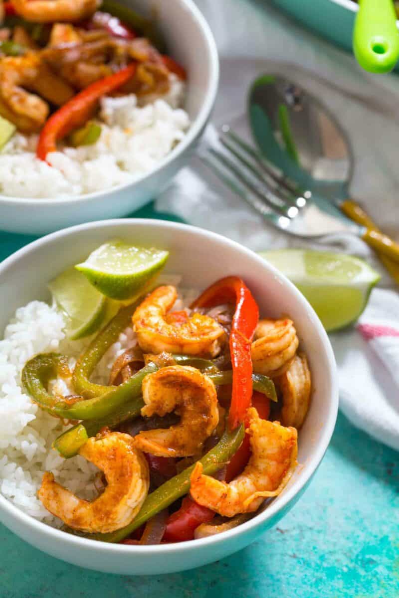 Shrimp fajita bowls are a quick dinner option for those busy night. Super flavorful and comes together in less than 20 minutes!