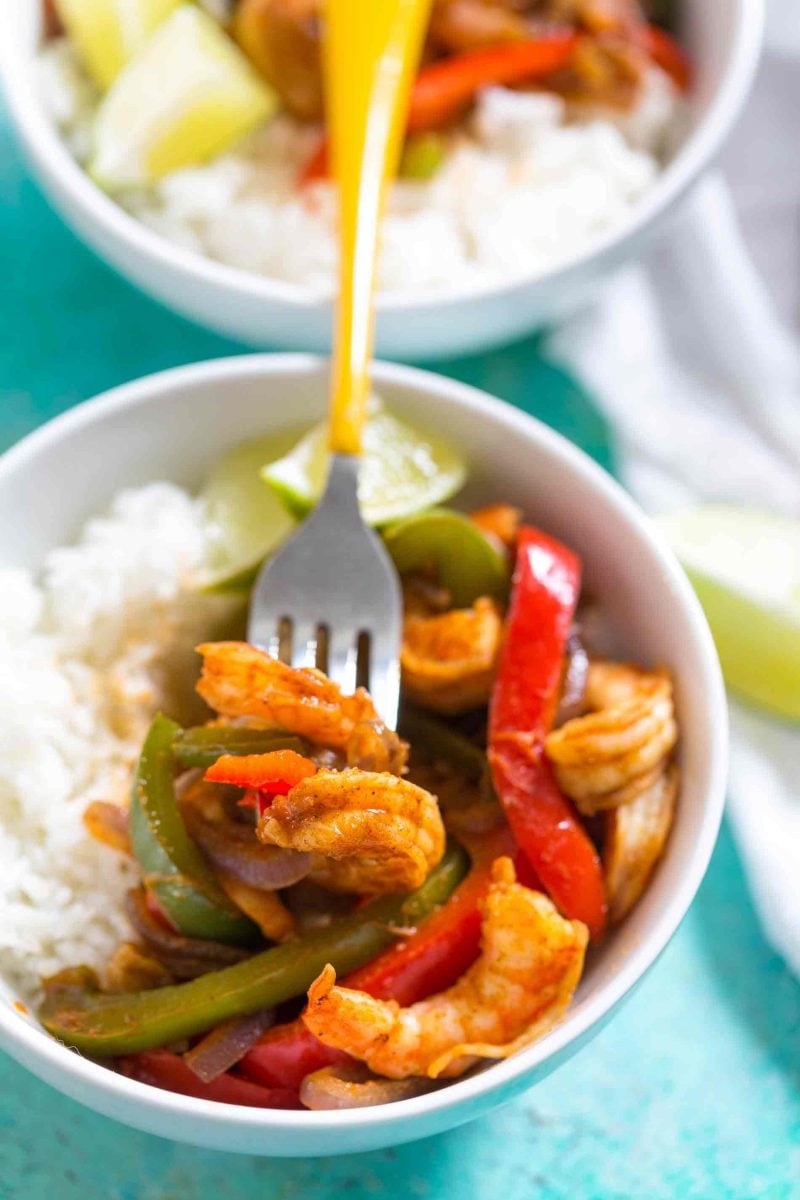 Shrimp fajita bowls are a quick dinner option for those busy night. Super flavorful and comes together in less than 20 minutes!