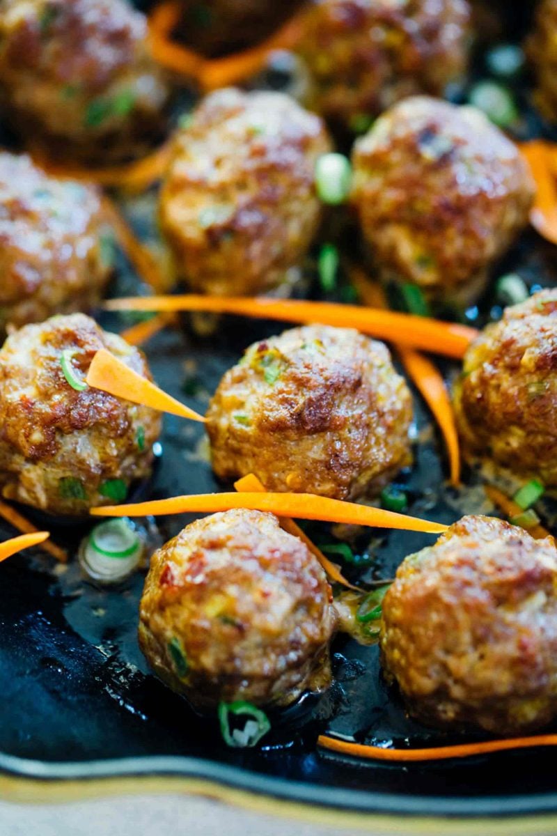 These Asian pork meatballs have a lot of flavor and are perfect topped on rice noodles or a bowl of rice! They are great for party appetizers too!