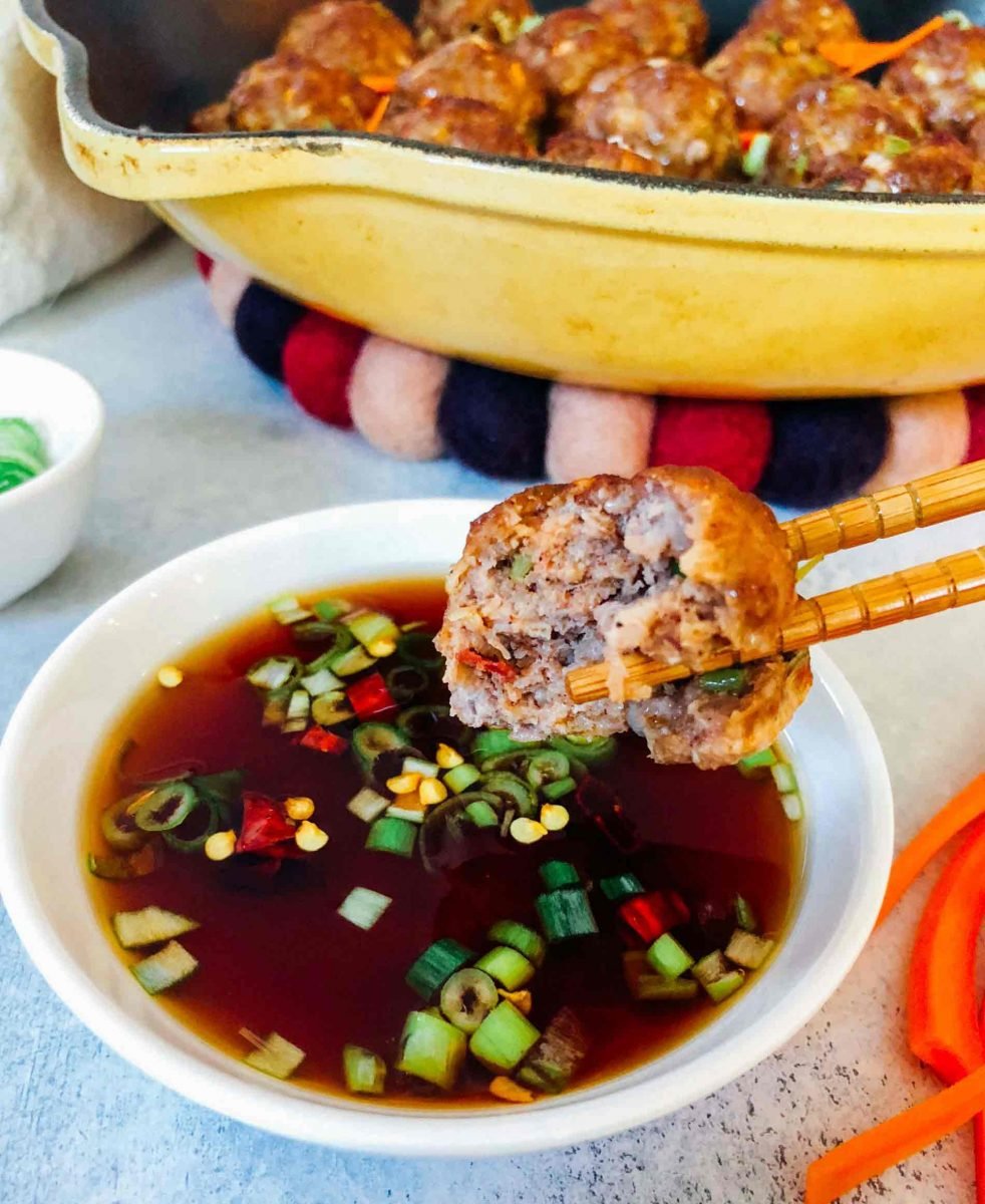 These Asian pork meatballs have a lot of flavor and are perfect topped on rice noodles or a bowl of rice! They are great for party appetizers too!