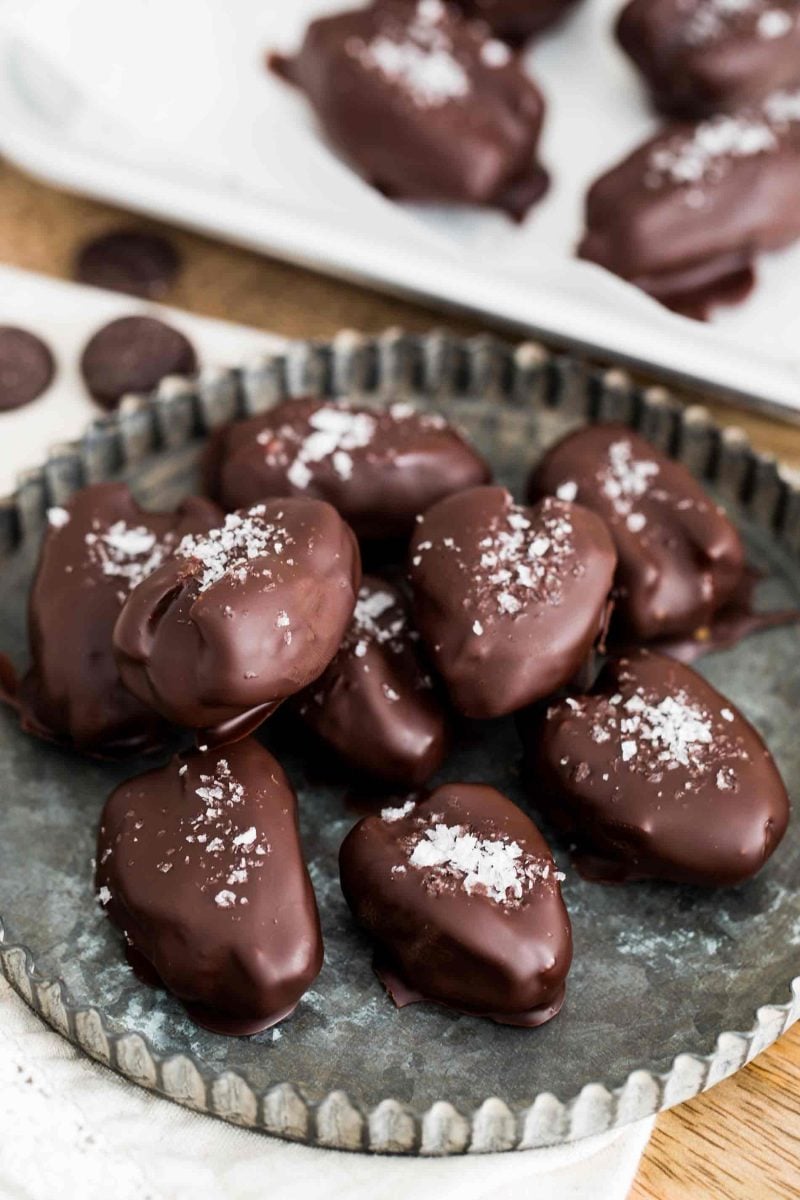 These chocolate covered stuffed dates are insanely easy to make and far too easy to eat just one. I dare you to resist having just one!