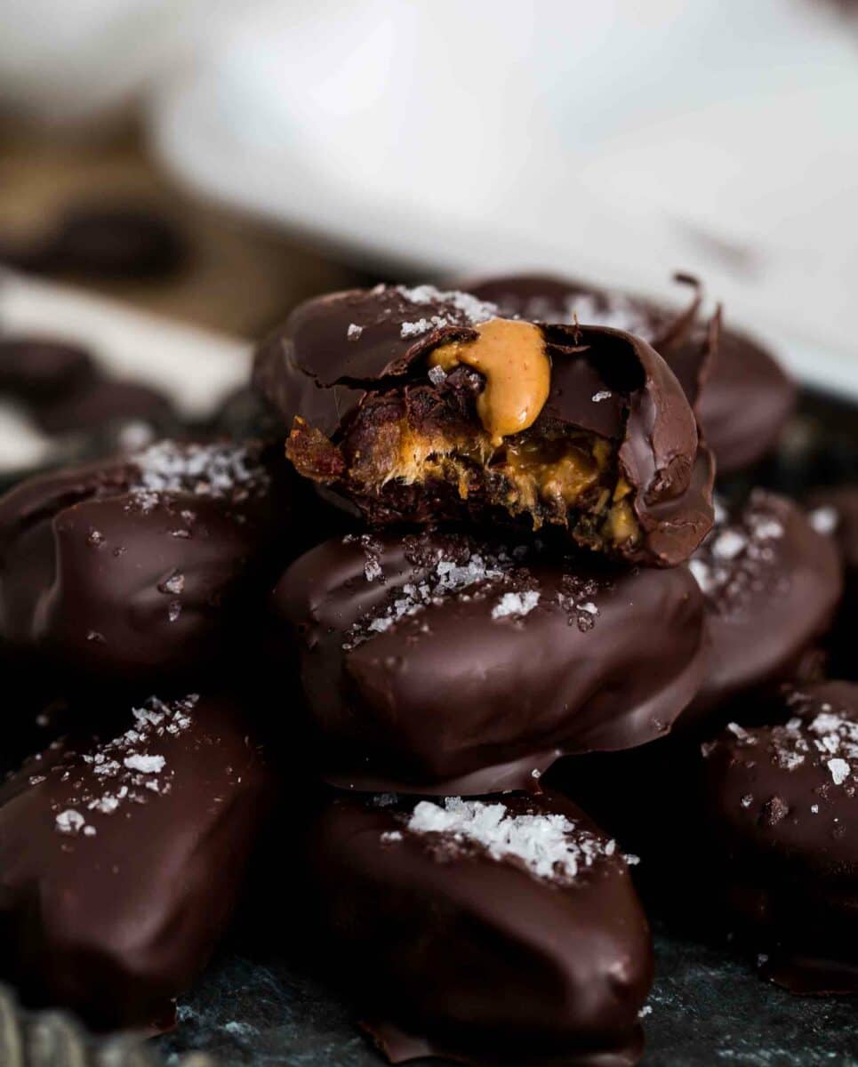 These chocolate covered stuffed dates are insanely easy to make and far too easy to eat just one. I dare you to resist having just one!