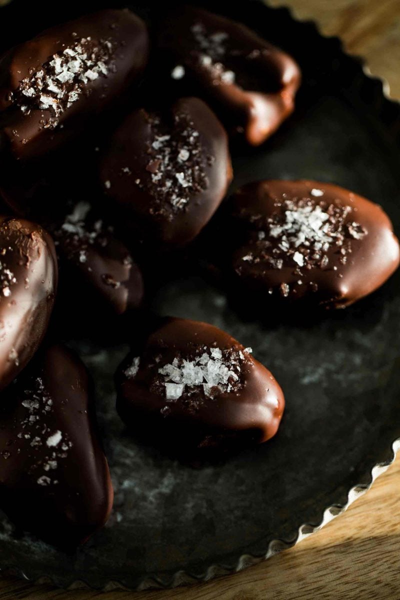 These chocolate covered stuffed dates are insanely easy to make and far too easy to eat just one. I dare you to resist having just one!