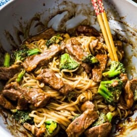 A take on the classic Chinese takeout dish but in a rice noodle dish! Super easy to make on a busy weeknight! This Asian beef and broccoli noodle dish is going to be your new favorite! #beefandbroccoli #ricenoodles #asiannoodles #asianrecipe #noodlerecipe