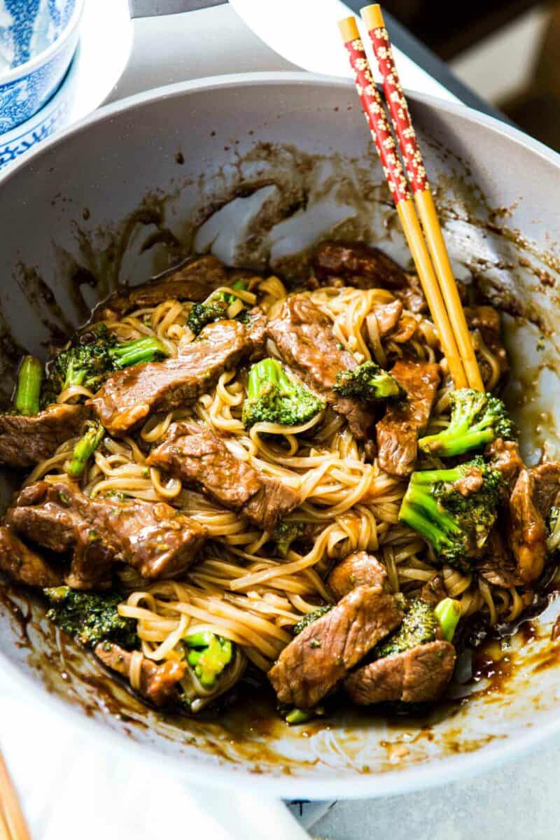 A take on the classic Chinese takeout dish but in a rice noodle dish! Super easy to make on a busy weeknight! This Asian beef and broccoli noodle dish is going to be your new favorite!