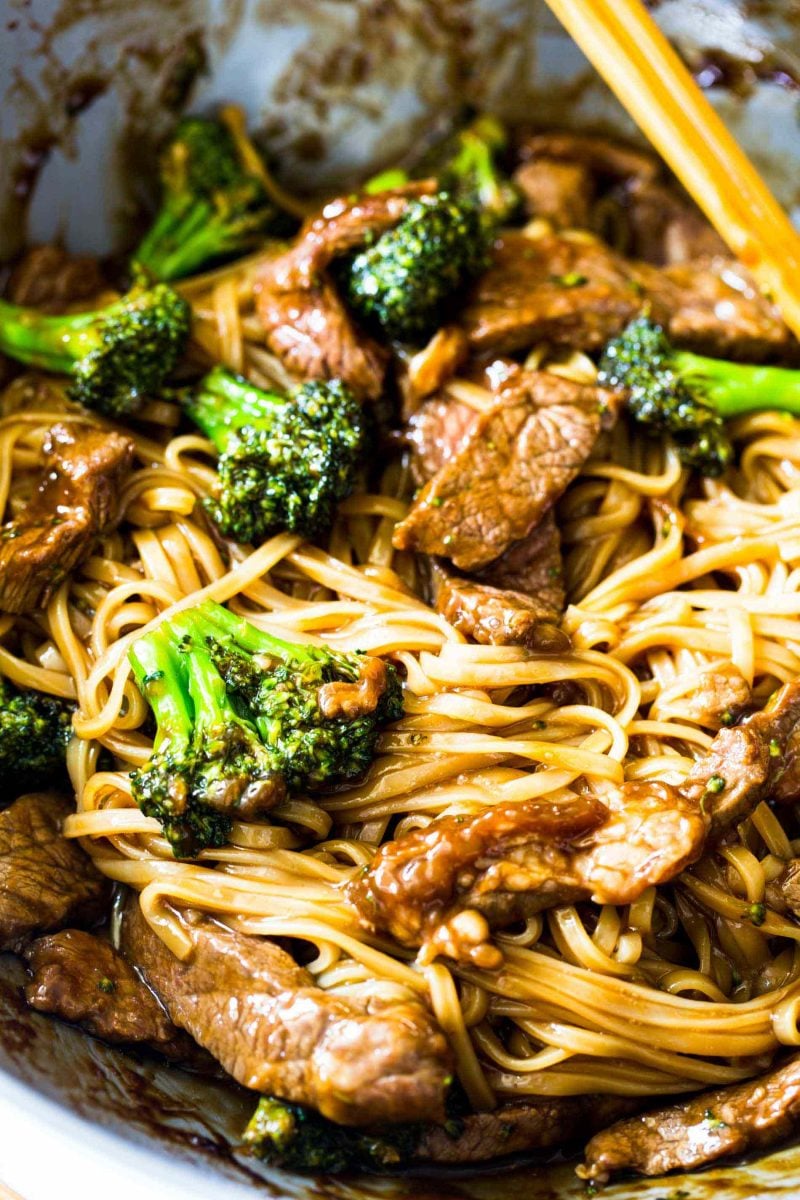 A take on the classic Chinese takeout dish but in a rice noodle dish! Super easy to make on a busy weeknight! This Asian beef and broccoli noodle dish is going to be your new favorite!