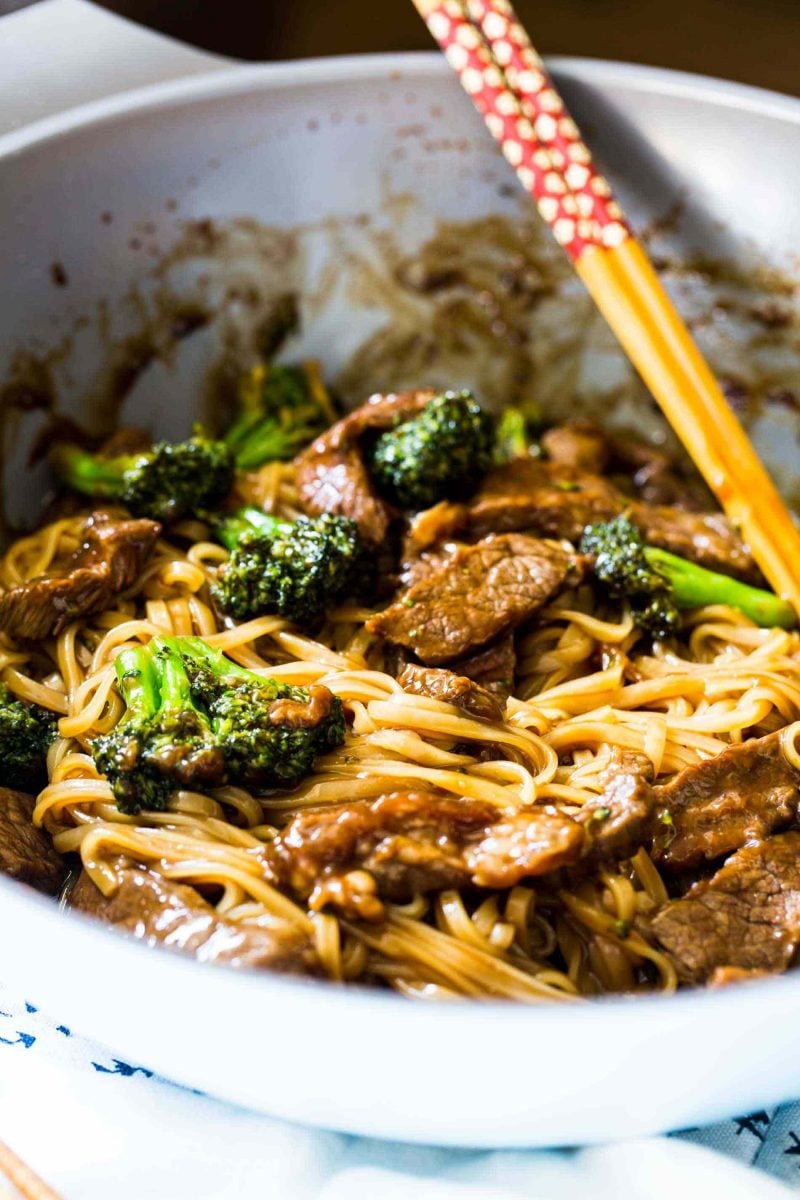 A take on the classic Chinese takeout dish but in a rice noodle dish! Super easy to make on a busy weeknight! This Asian beef and broccoli noodle dish is going to be your new favorite!