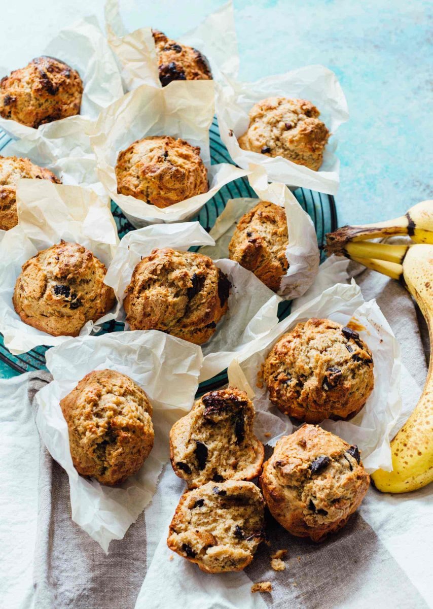 These peanut butter and chocolate banana muffins are so soft and tender with the biggest domed top! They're just like straight out of a bakery!