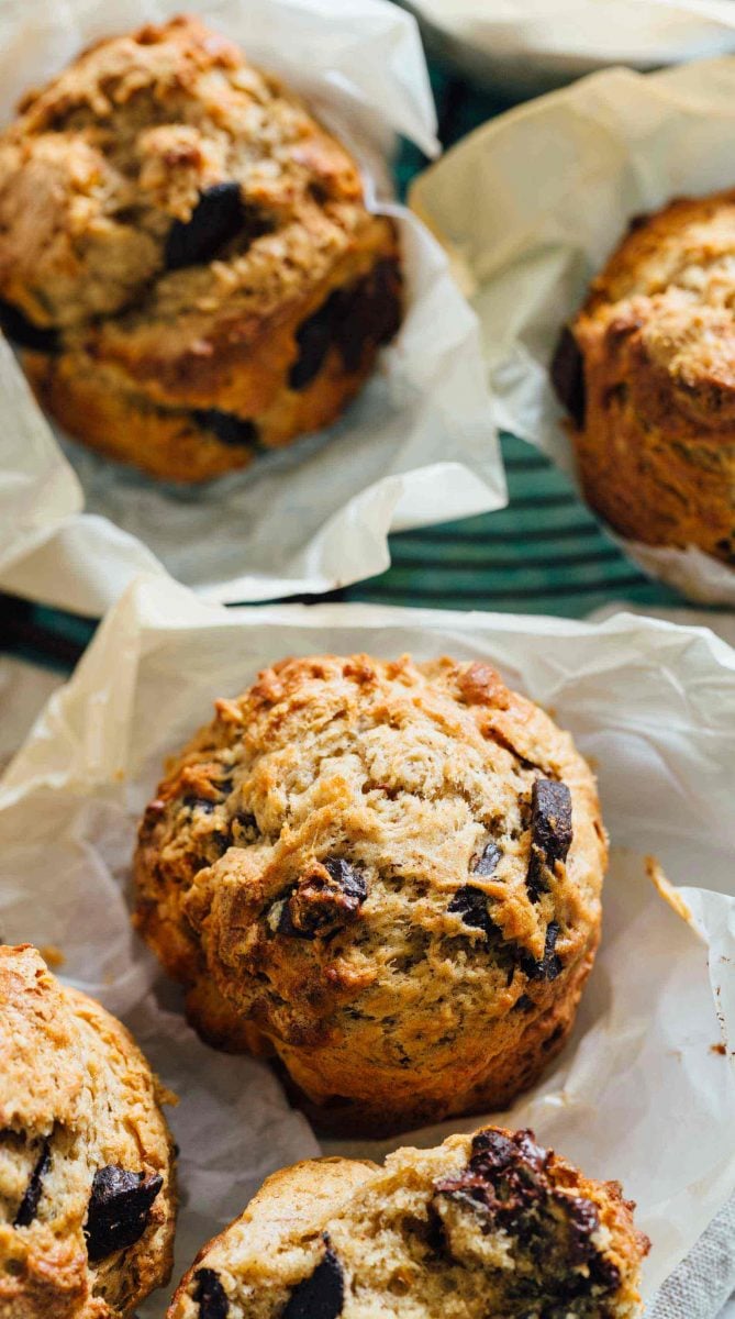 These peanut butter and chocolate banana muffins are so soft and tender with the biggest domed top! They're just like straight out of a bakery!