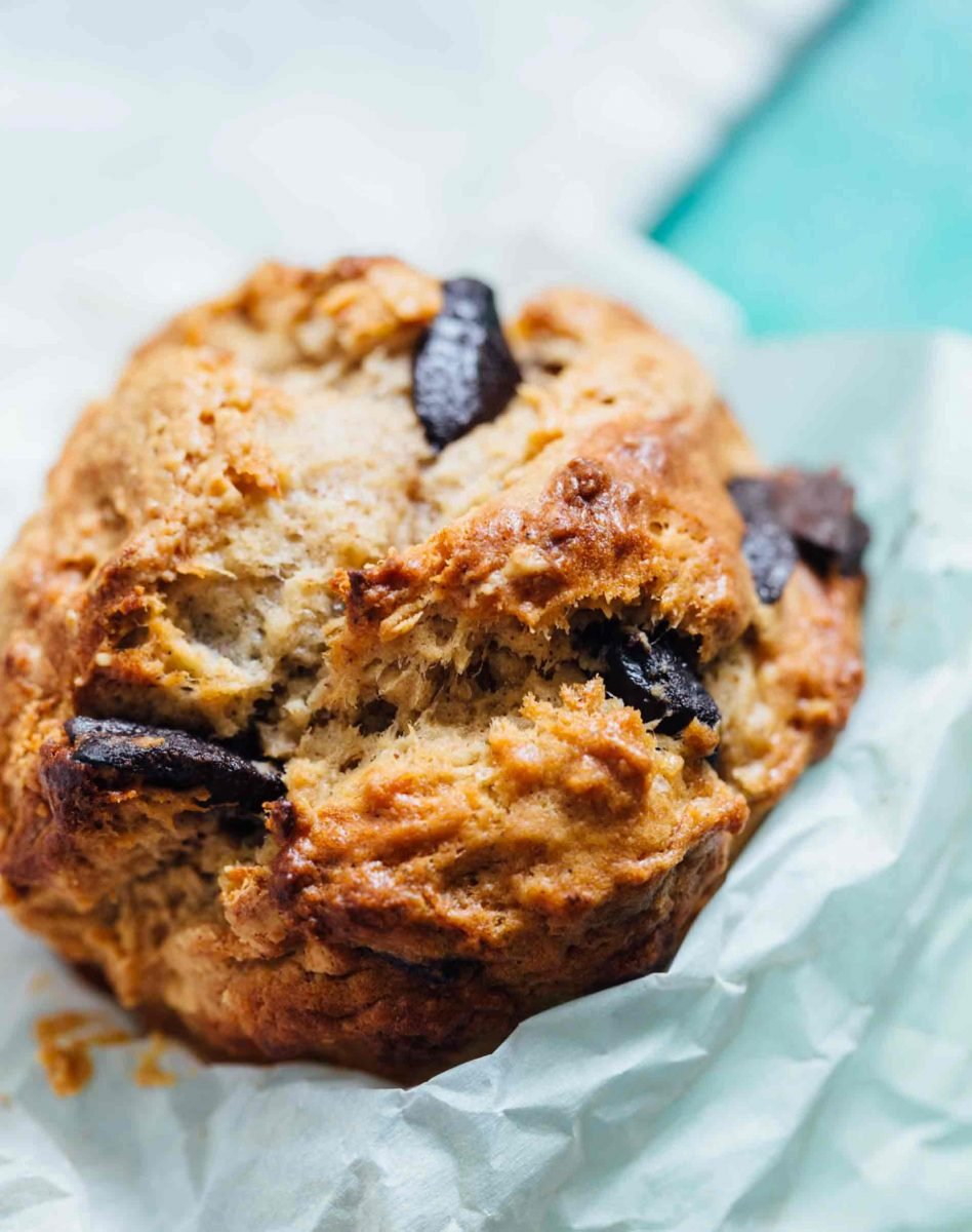 These peanut butter and chocolate banana muffins are so soft and tender with the biggest domed top! They're just like straight out of a bakery!