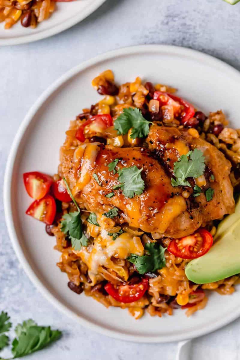 This one-pot BBQ chicken and rice is a weeknight meal saver! It is loaded with flavor and it's basically like having your favorite BBQ restaurant chicken and rice dish at home!