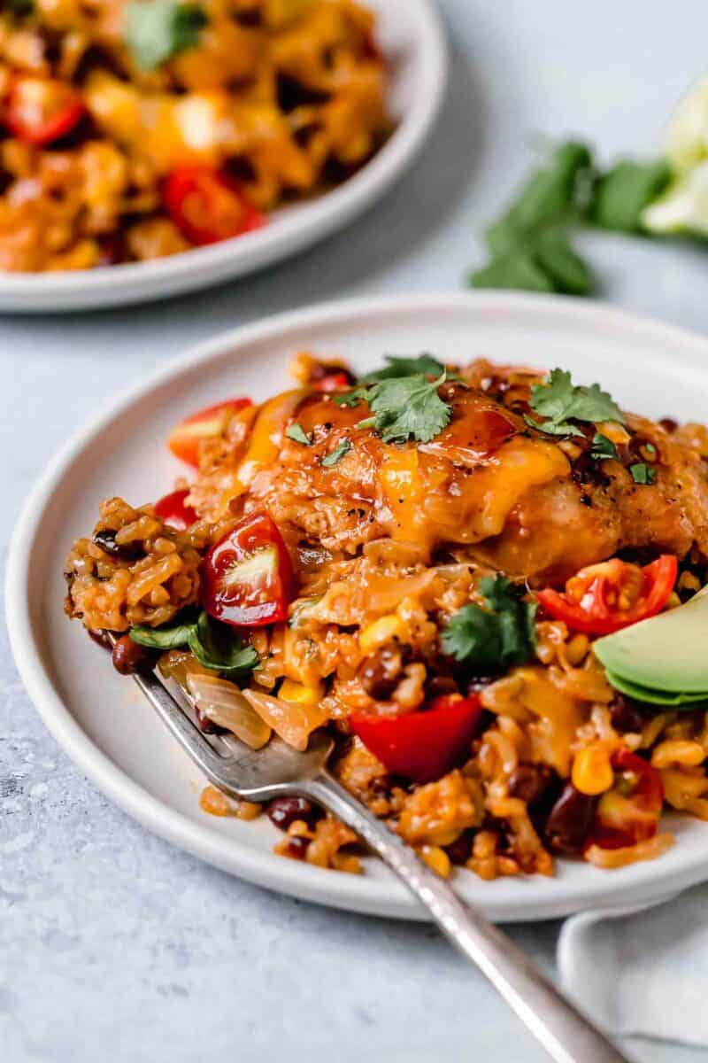 This one-pot BBQ chicken and rice is a weeknight meal saver! It is loaded with flavor and it's basically like having your favorite BBQ restaurant chicken and rice dish at home!