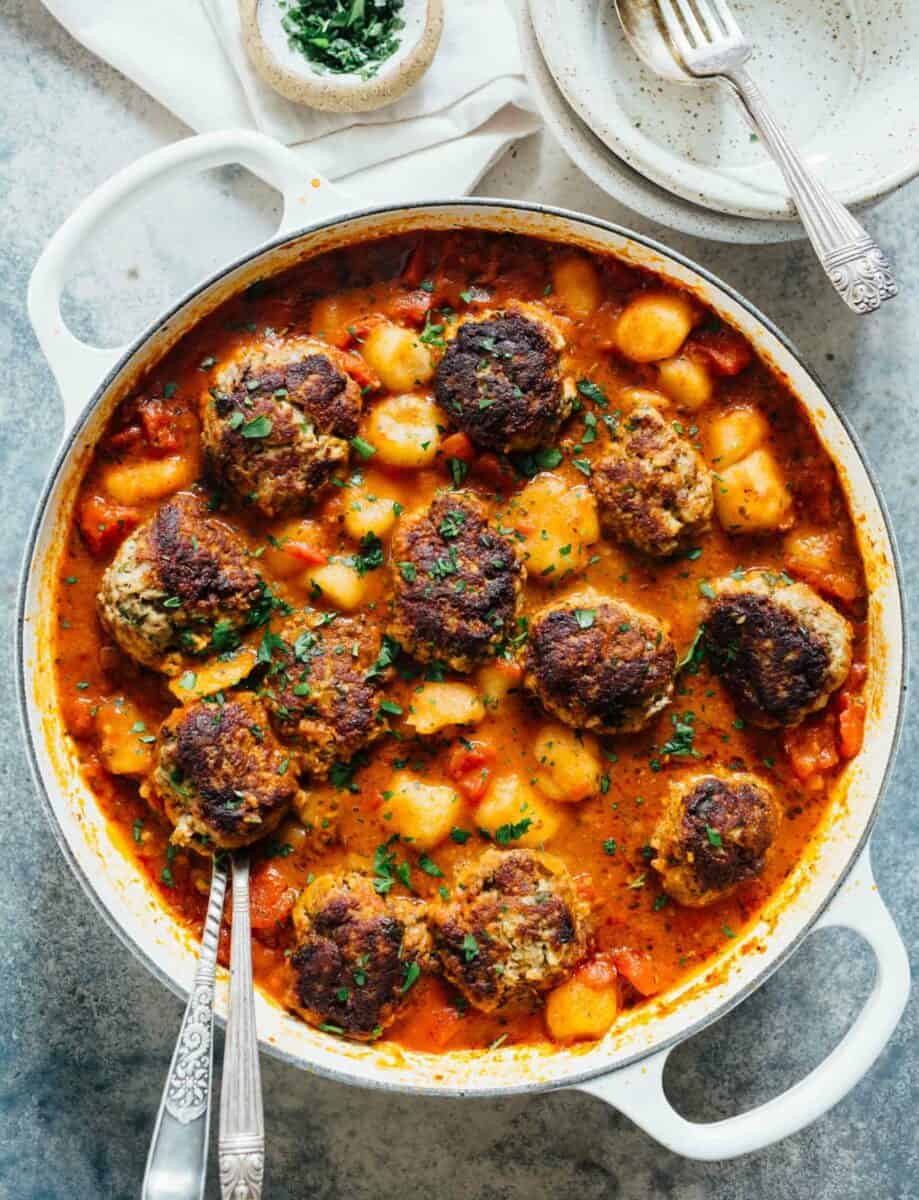 Cauliflower gnocchi and meatballs is a cozy alternative to the classic spaghetti and meatballs. All made in one-skillet! Who can complain?!