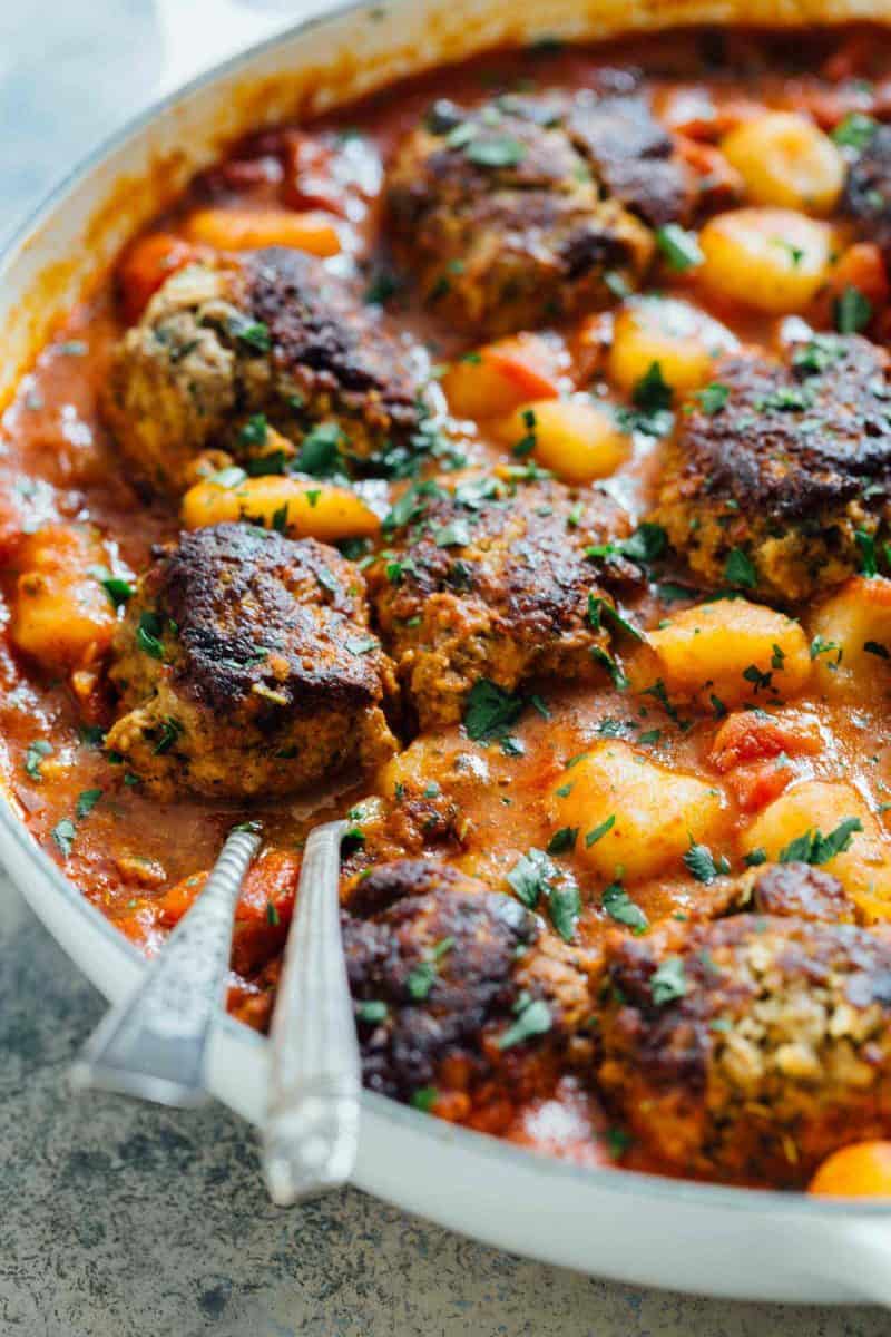 Cauliflower gnocchi and meatballs is a cozy alternative to the classic spaghetti and meatballs. All made in one-skillet! Who can complain?!