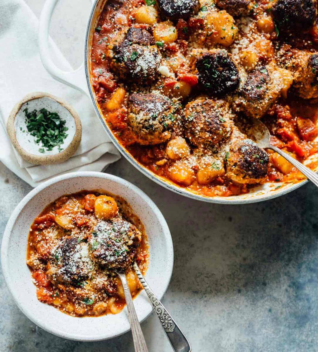 Cauliflower gnocchi and meatballs is a cozy alternative to the classic spaghetti and meatballs. All made in one-skillet! Who can complain?!