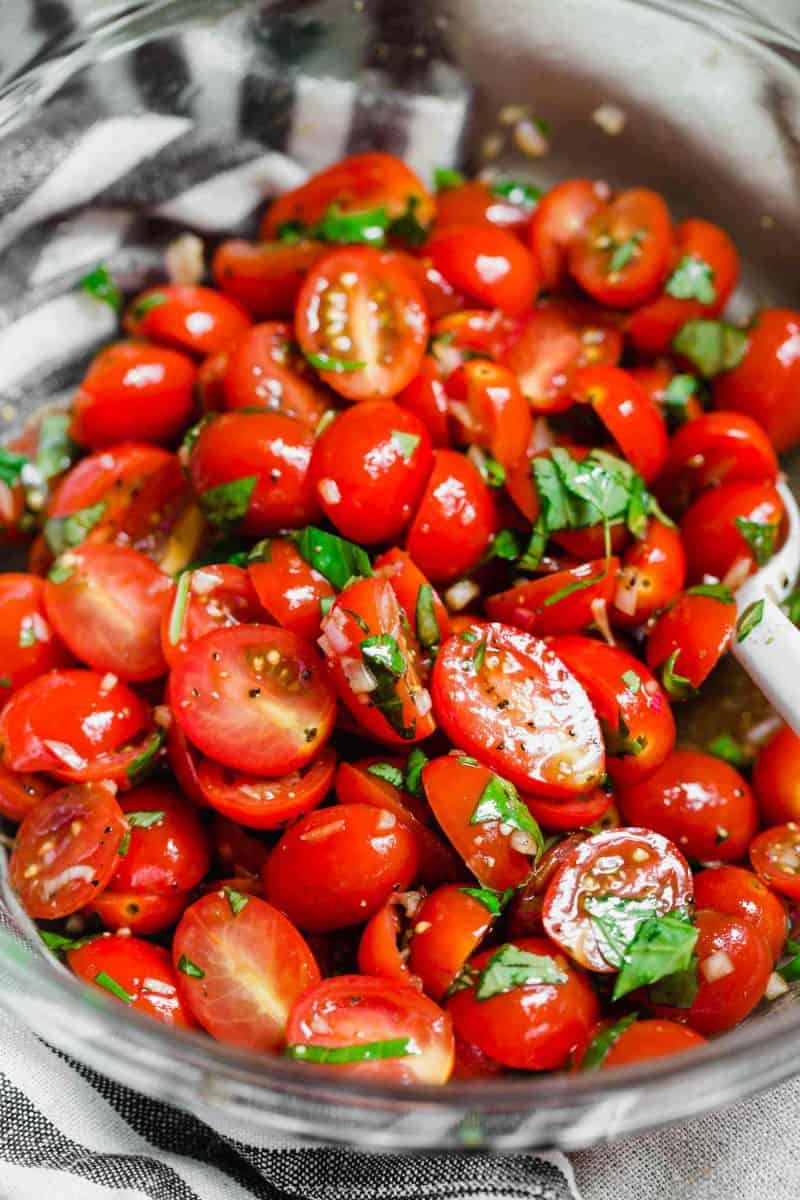 This is the best summer tomato salad! With a short ingredient list, this fresh salad will have you making it all summer long! This is the best summer tomato salad! With a short ingredient list, this fresh salad will have you making it all summer long!
