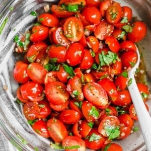 This is the best summer tomato salad! With a short ingredient list, this fresh salad will have you making it all summer long! #tomato #tomatosalad #summersalad #freshingredients